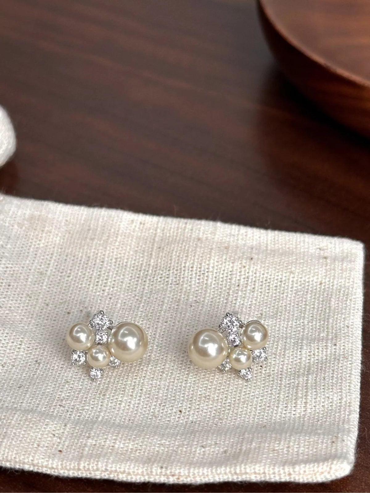 pearl cluster stud earrings angle view
