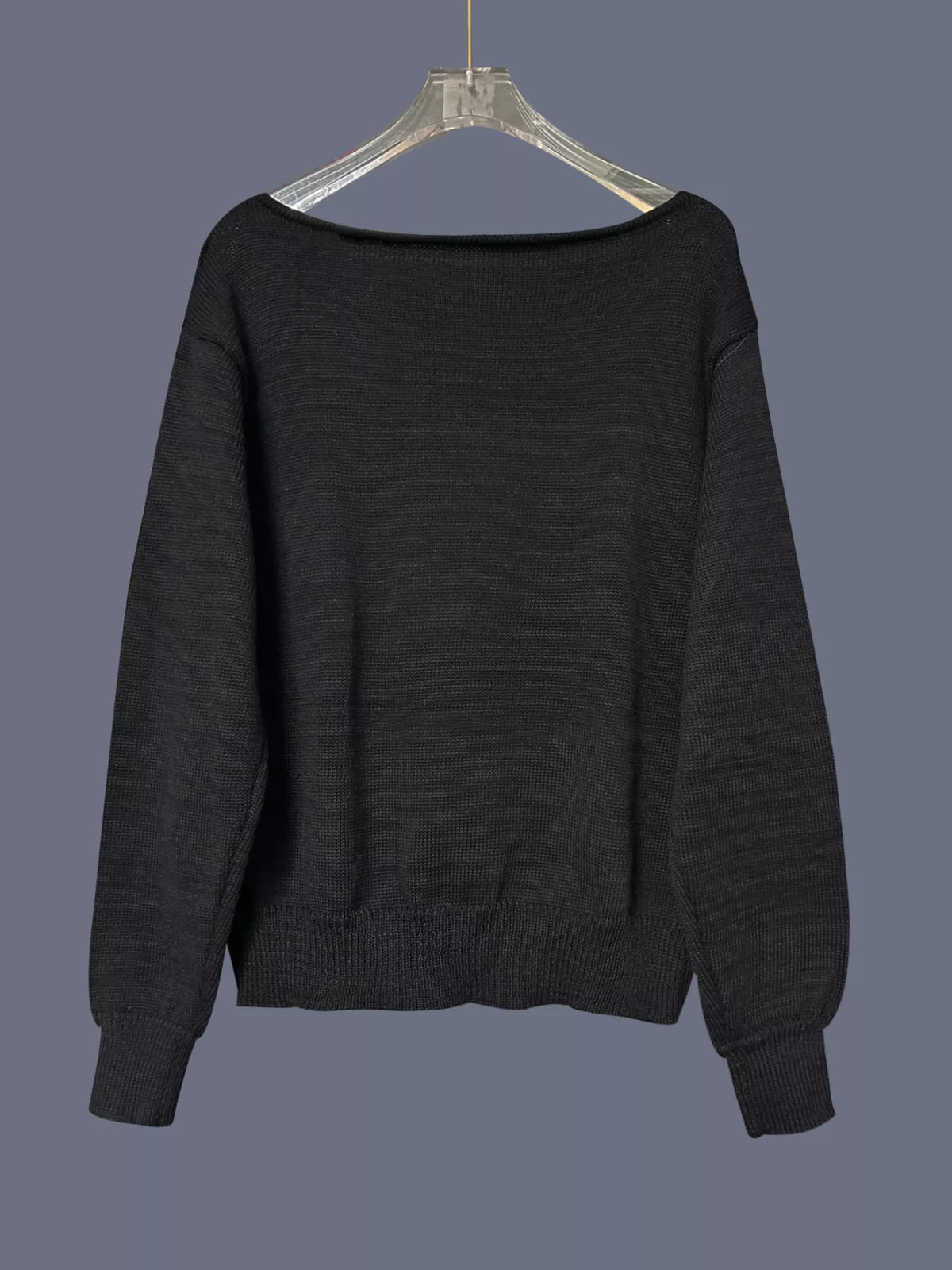 Studded knit top on model