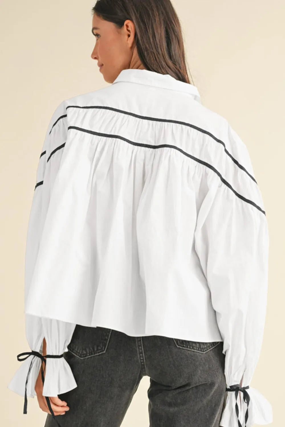 White collared shirt back view