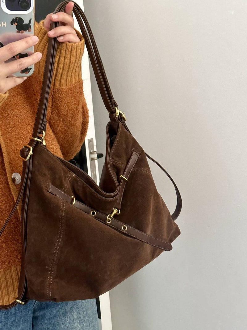 Brown nylon adjustable strap shoulder bag front view