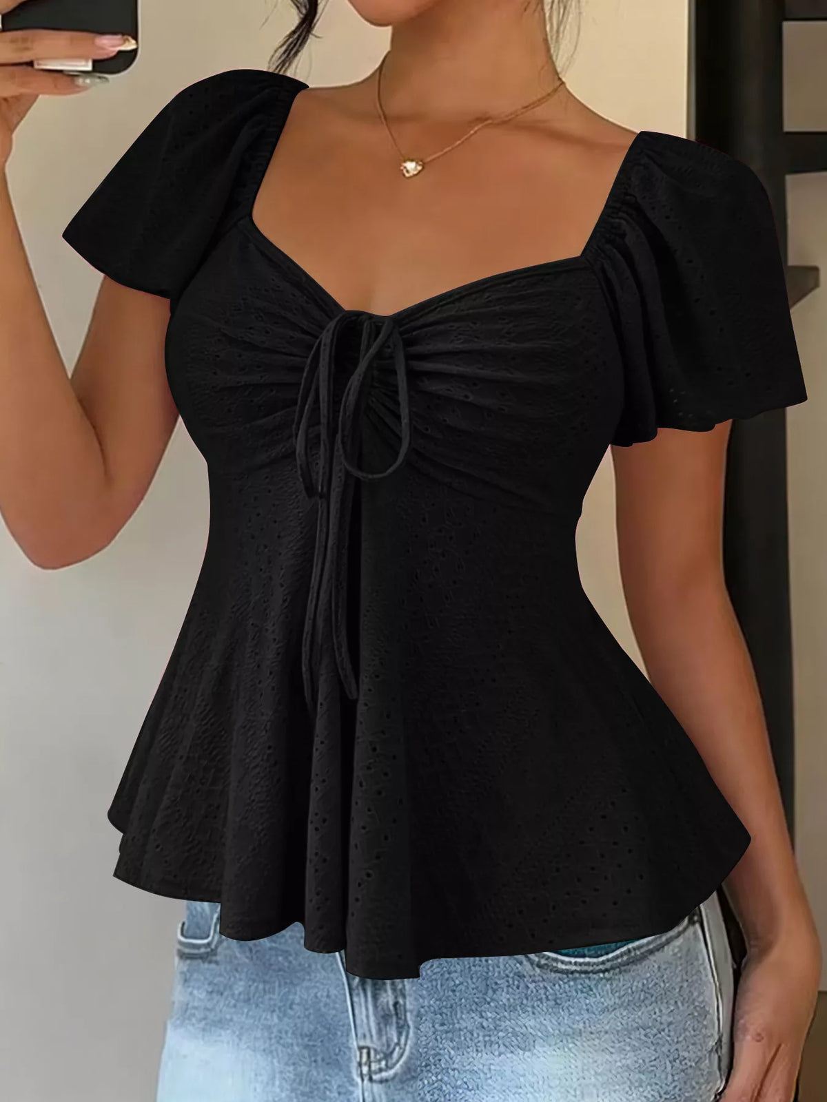 Eyelet top shown in white