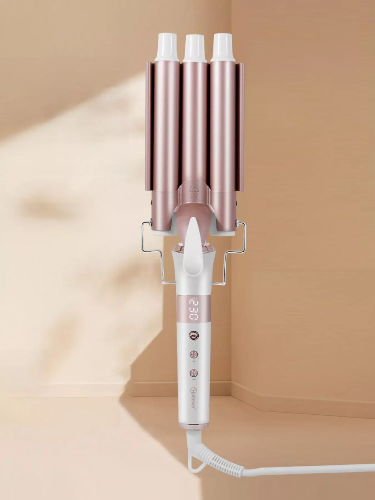 Rose gold 3 barrel curling iron front view
