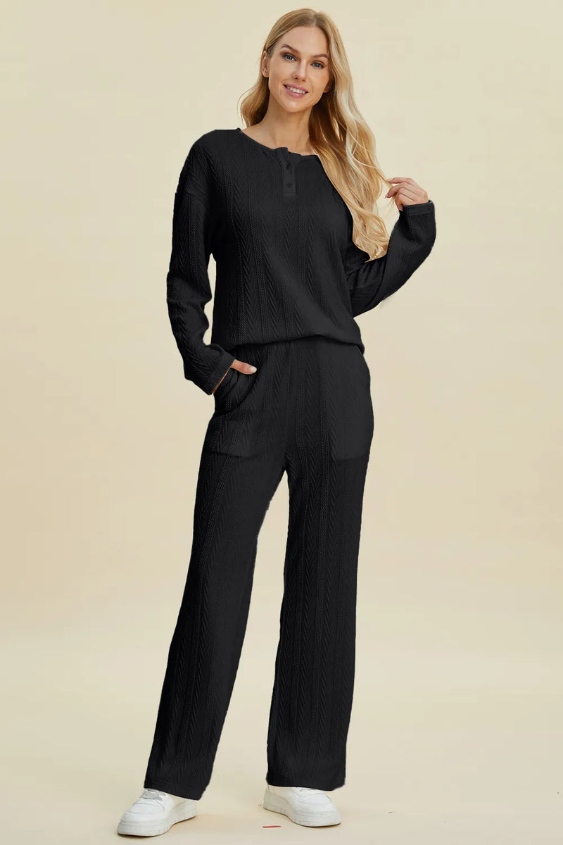 Cable knit long sleeve top and pants set shown as a full outfit