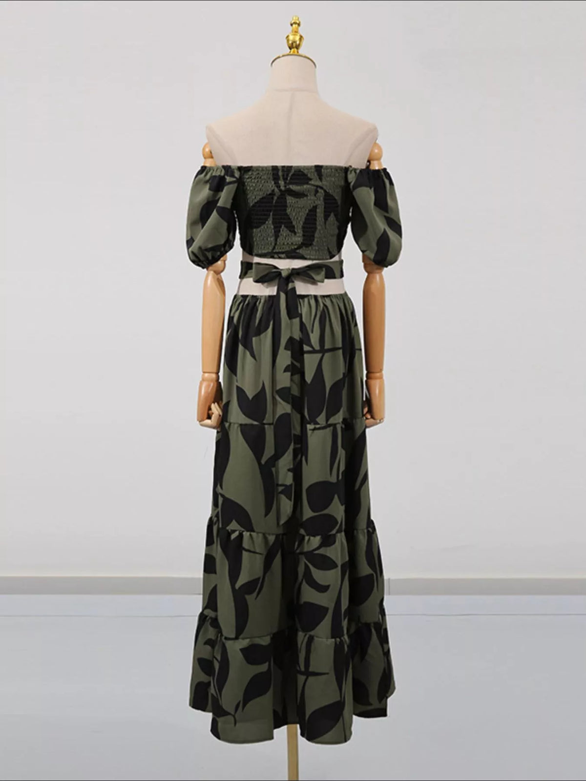 Off shoulder leaf print smocked maxi dress, skirt and hem detail