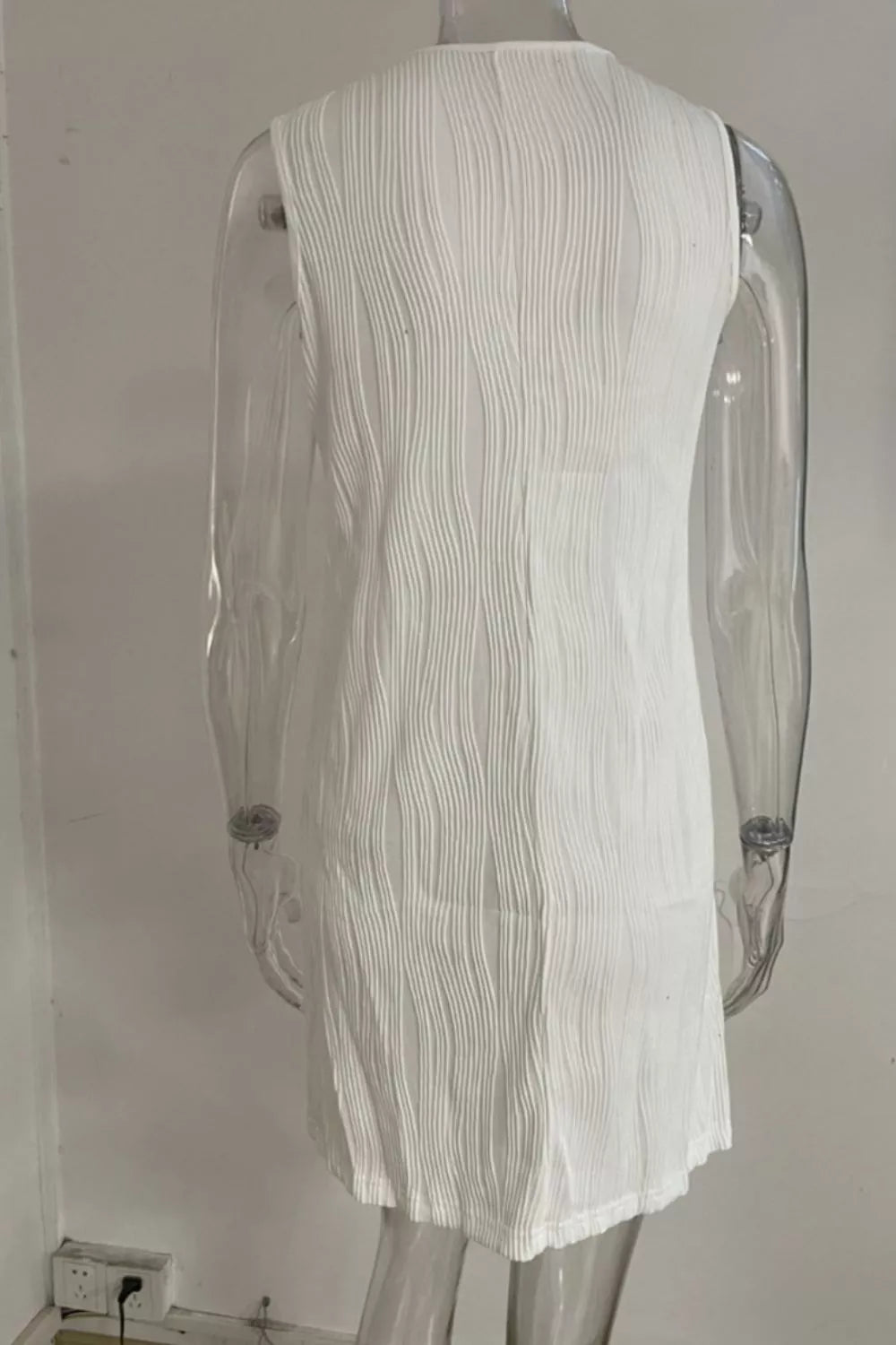 Black sleeveless textured casual mini dress front view