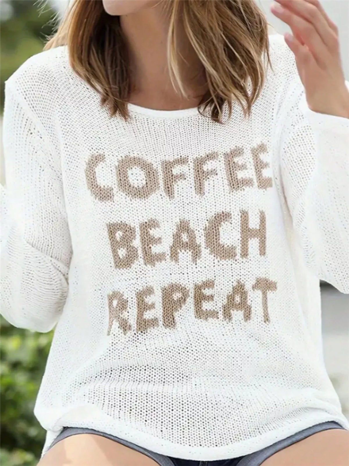 Letter graphic knit top detail