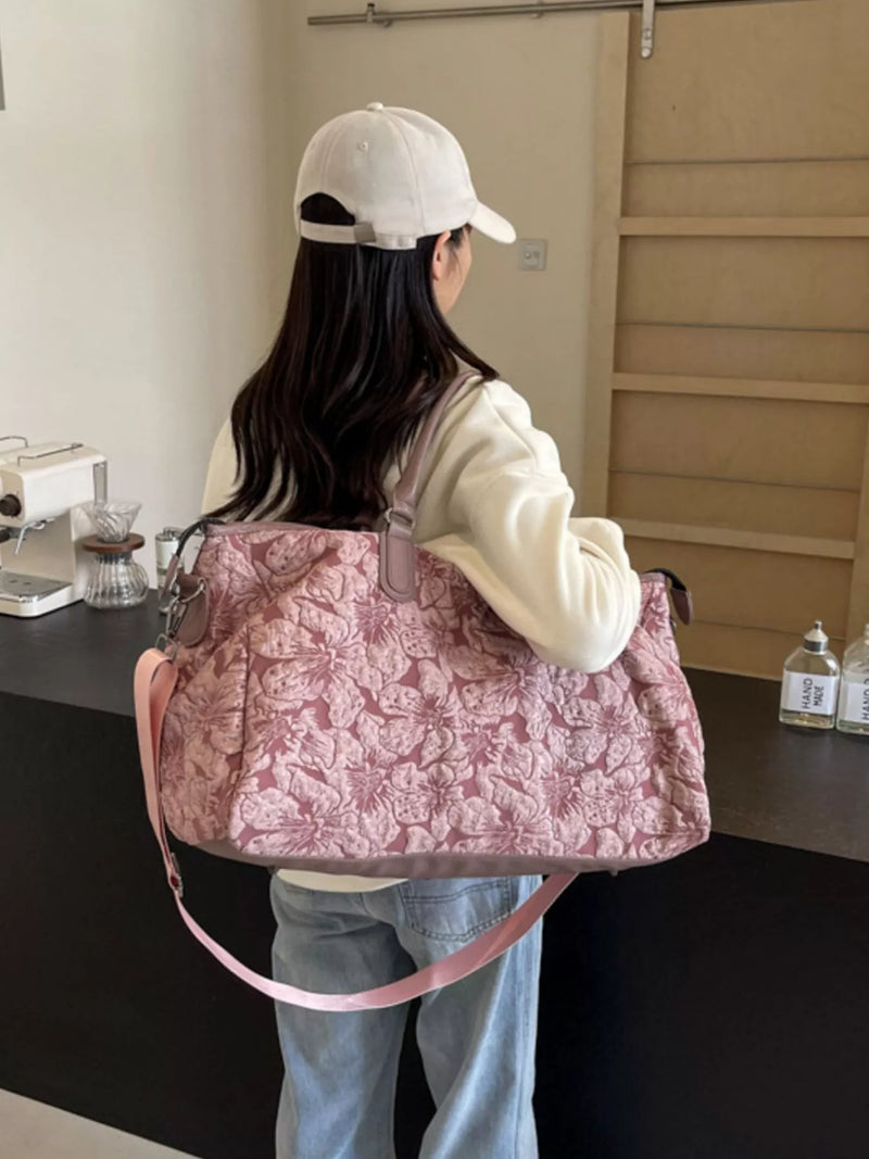 Pink floral quilted travel duffel front view