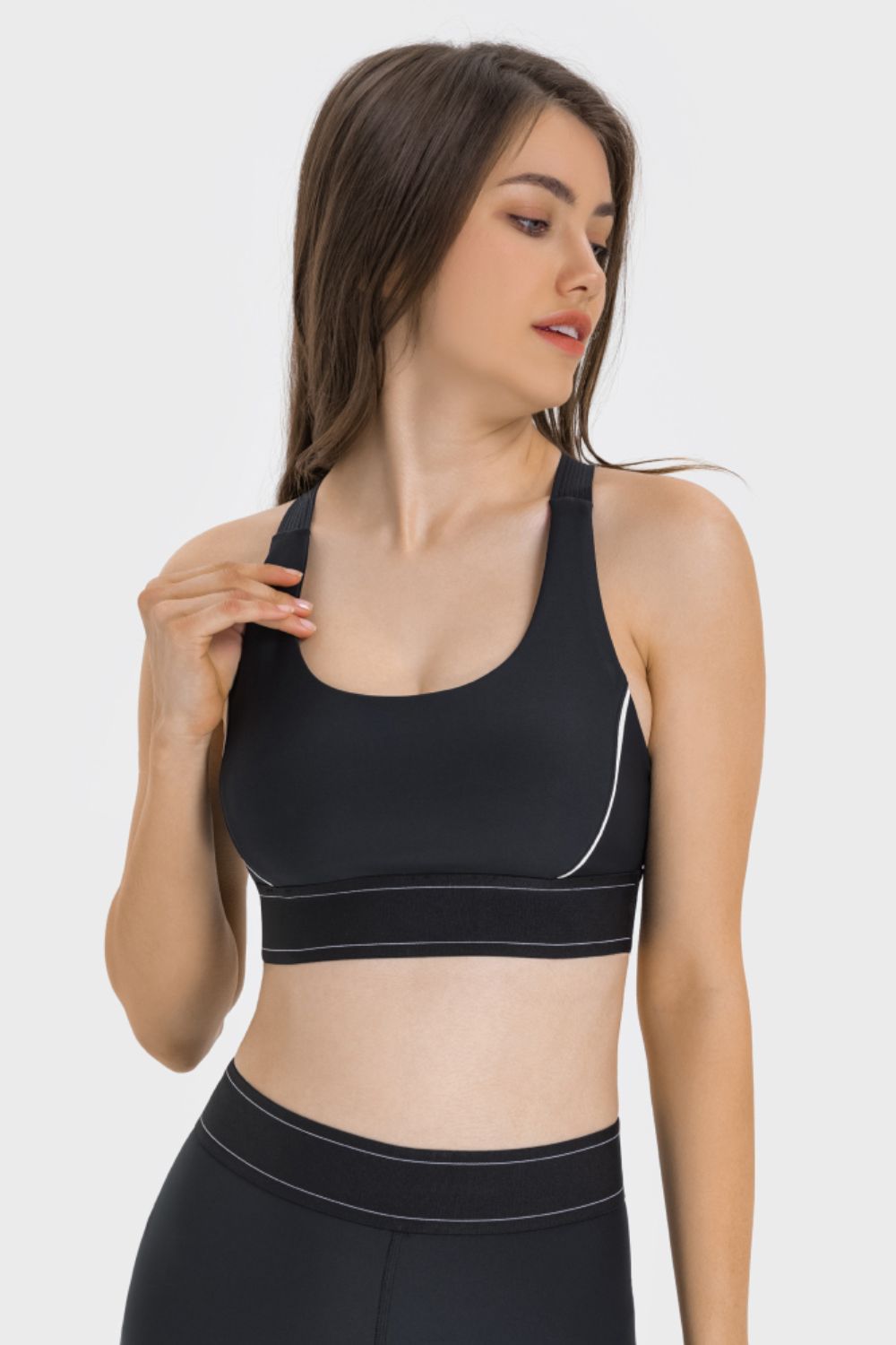 Close up of contrast trim on sports bra