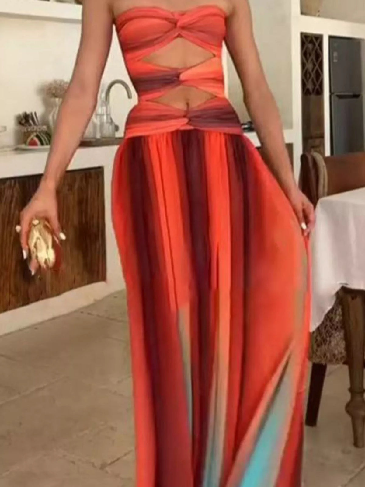 Orange red strapless cutout maxi dress, styled on model