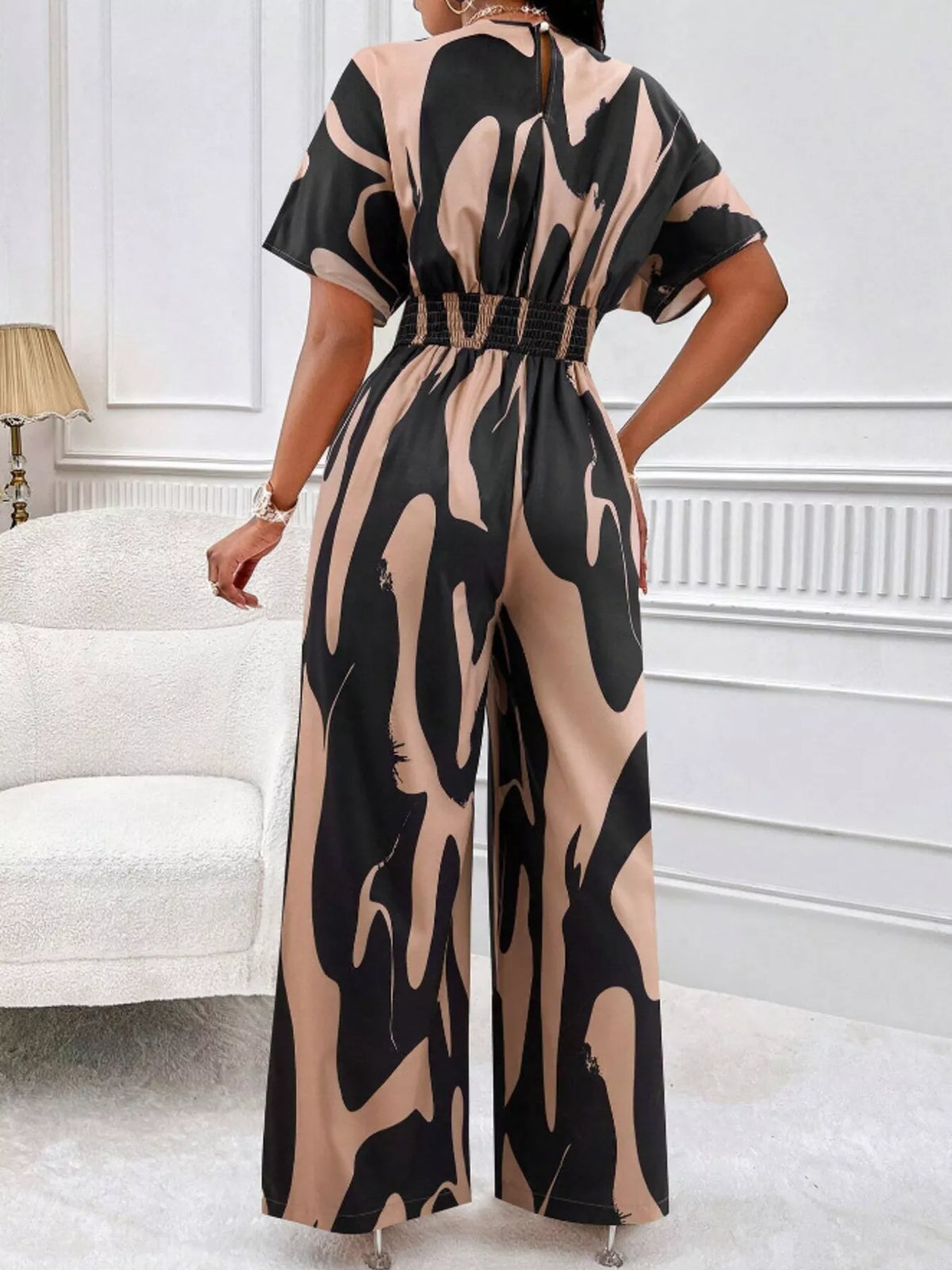 Abstract print wide leg jumpsuit with ruched bodice side view