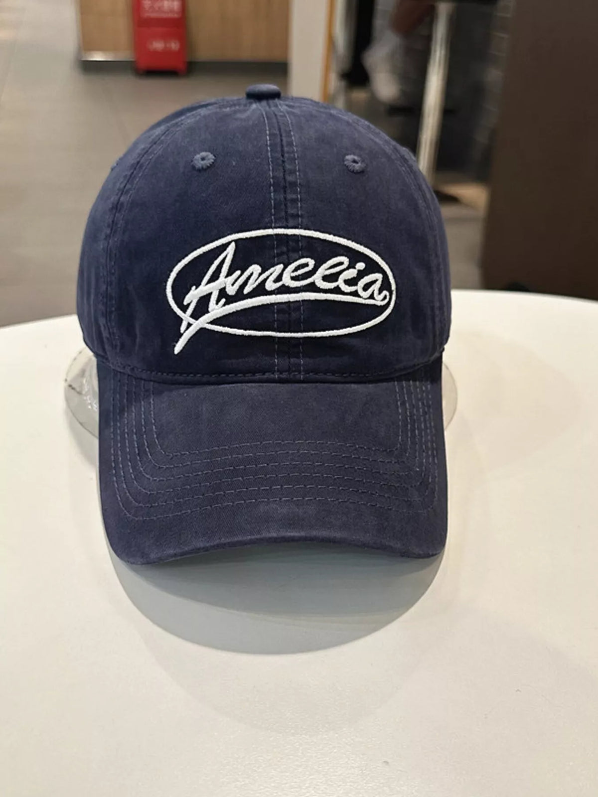 Close view of the embroidery on the front of the cap