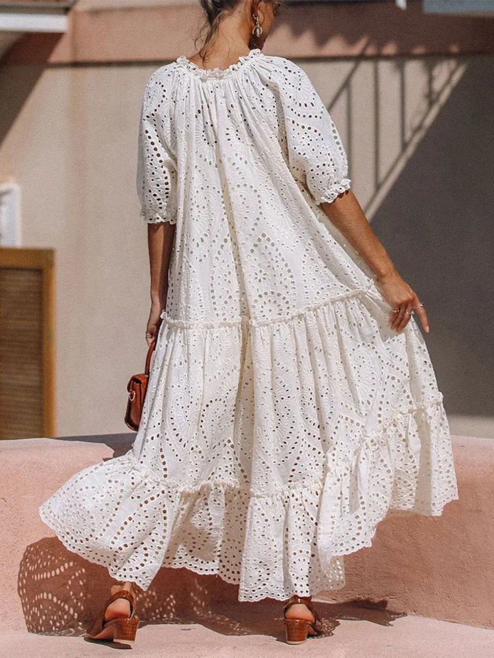 Ivory tiered dress tie neckline detail