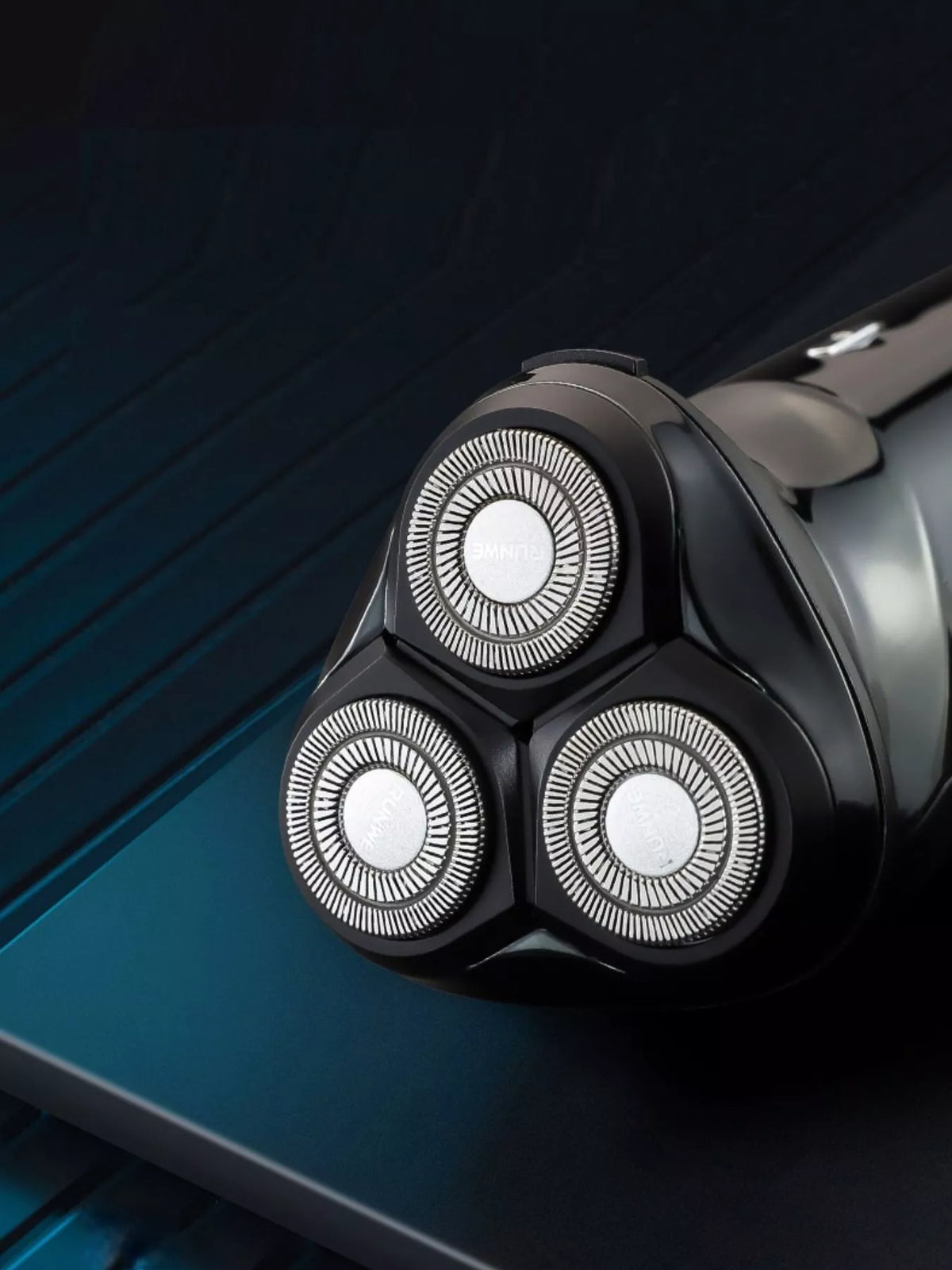 Rechargeable electric shaver held in hand