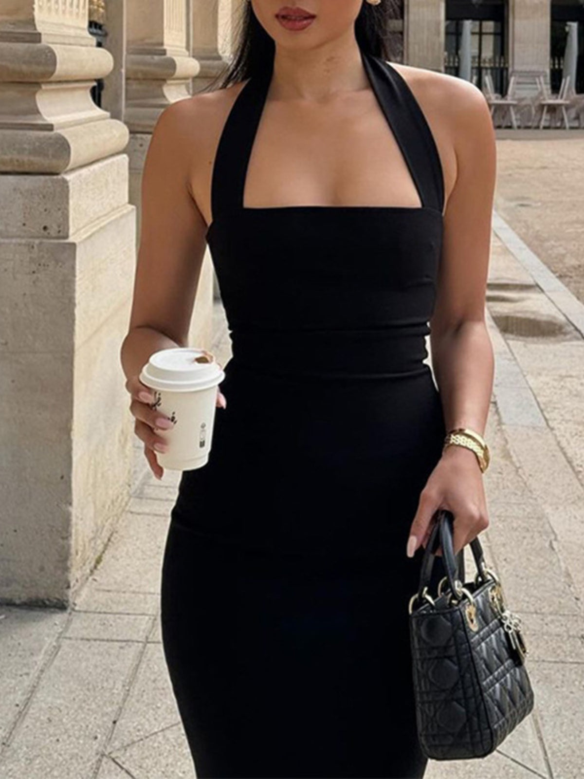 Back view of the halter neck midi dress