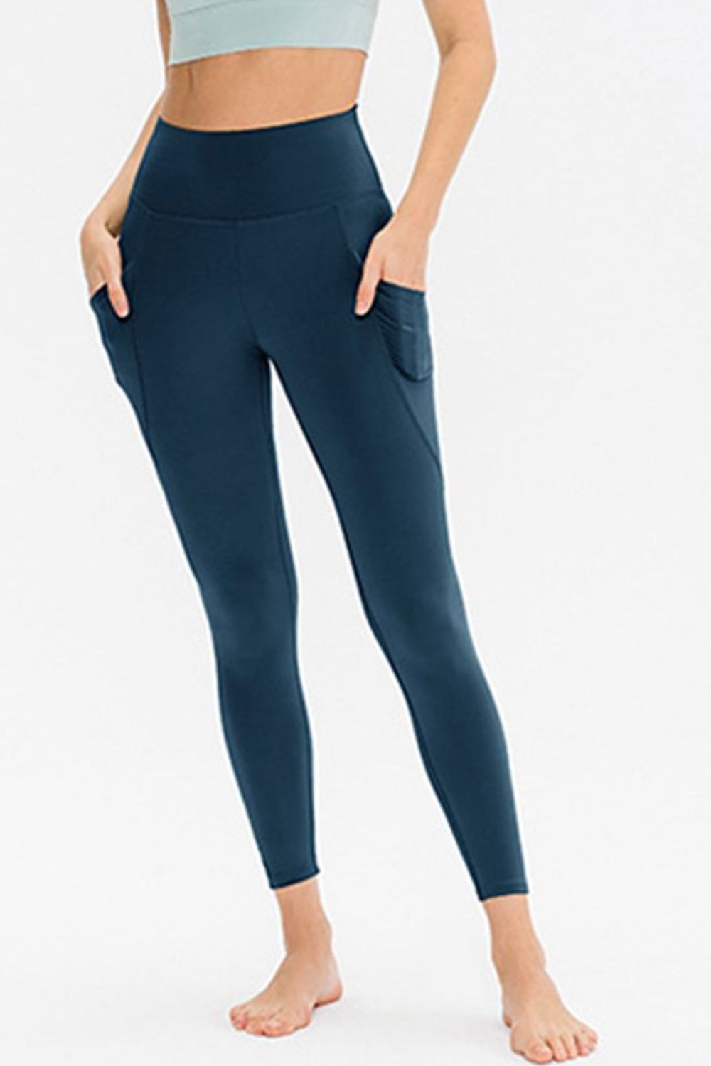 Slim fit active leggings with pockets front view