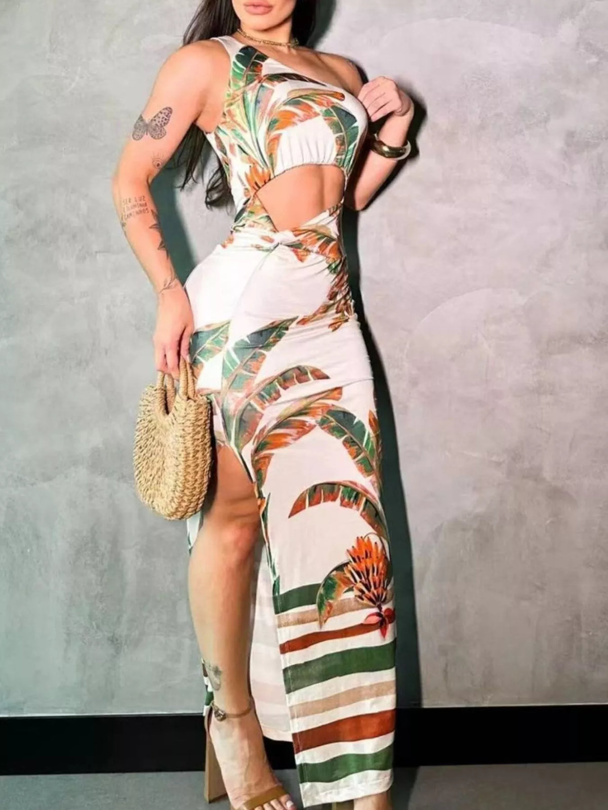 Front view of the tropical print one shoulder maxi dress