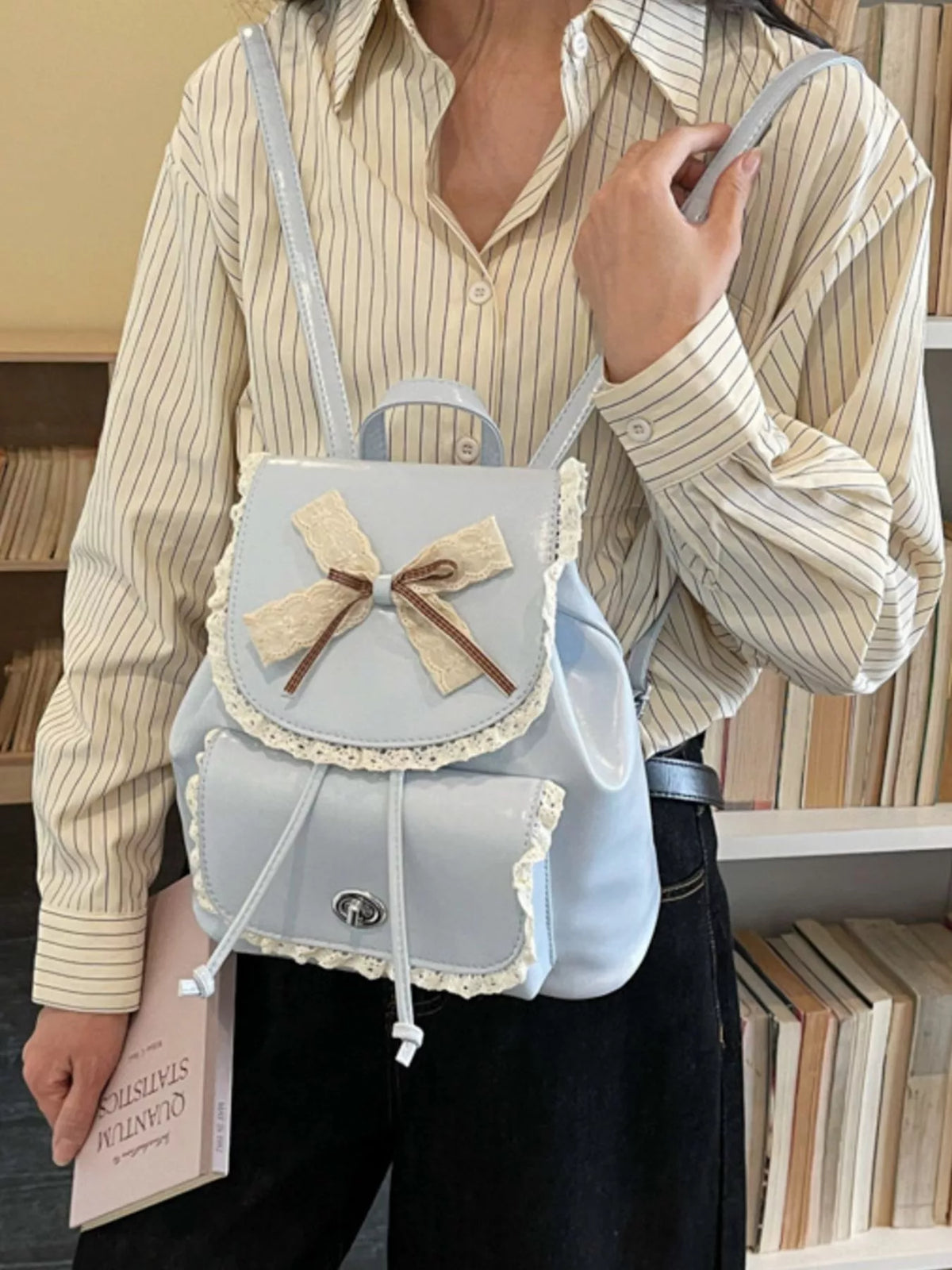 Blue lace bow mini backpack interior compartment