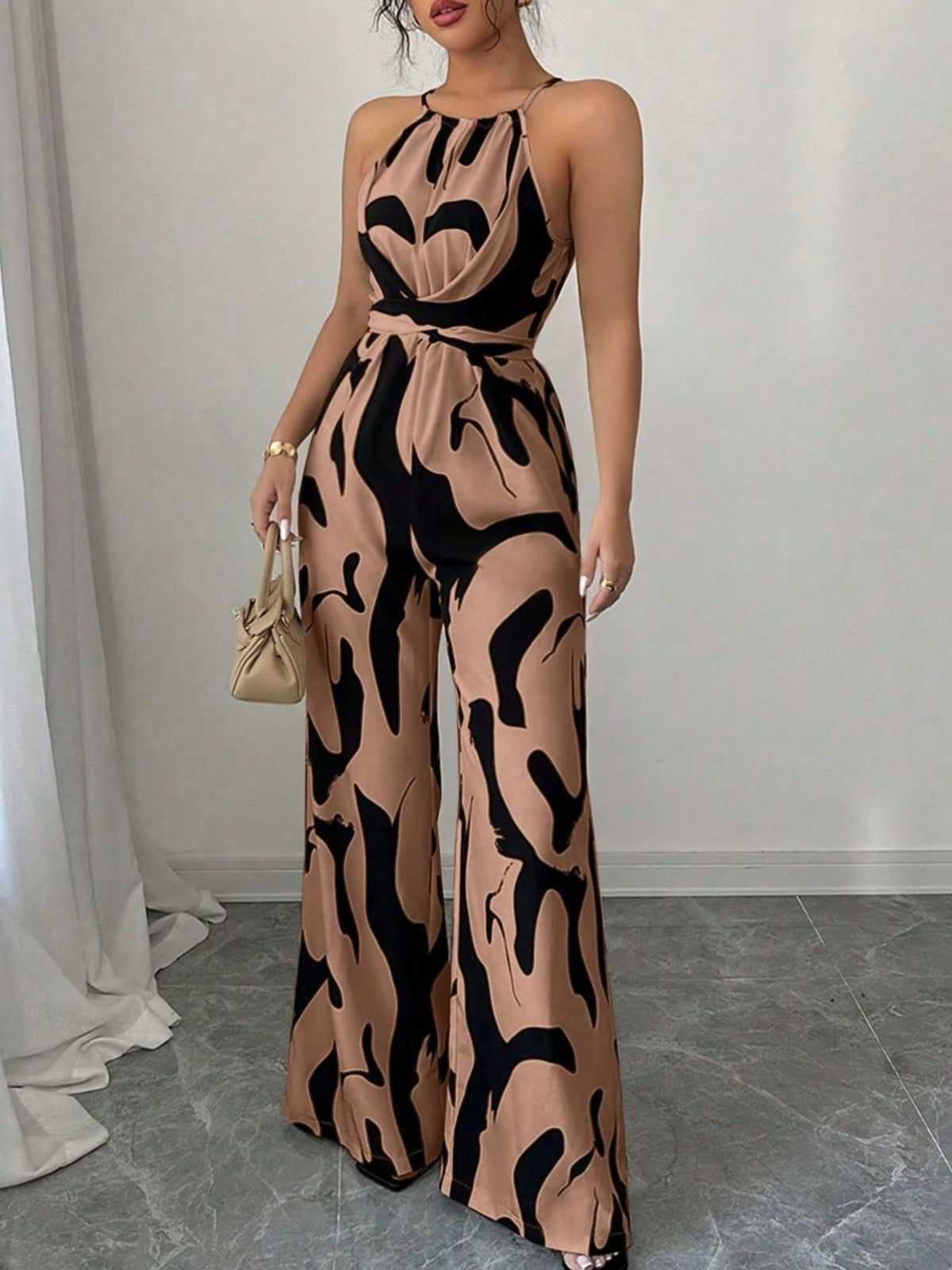 Close up of tie waist detail on jumpsuit