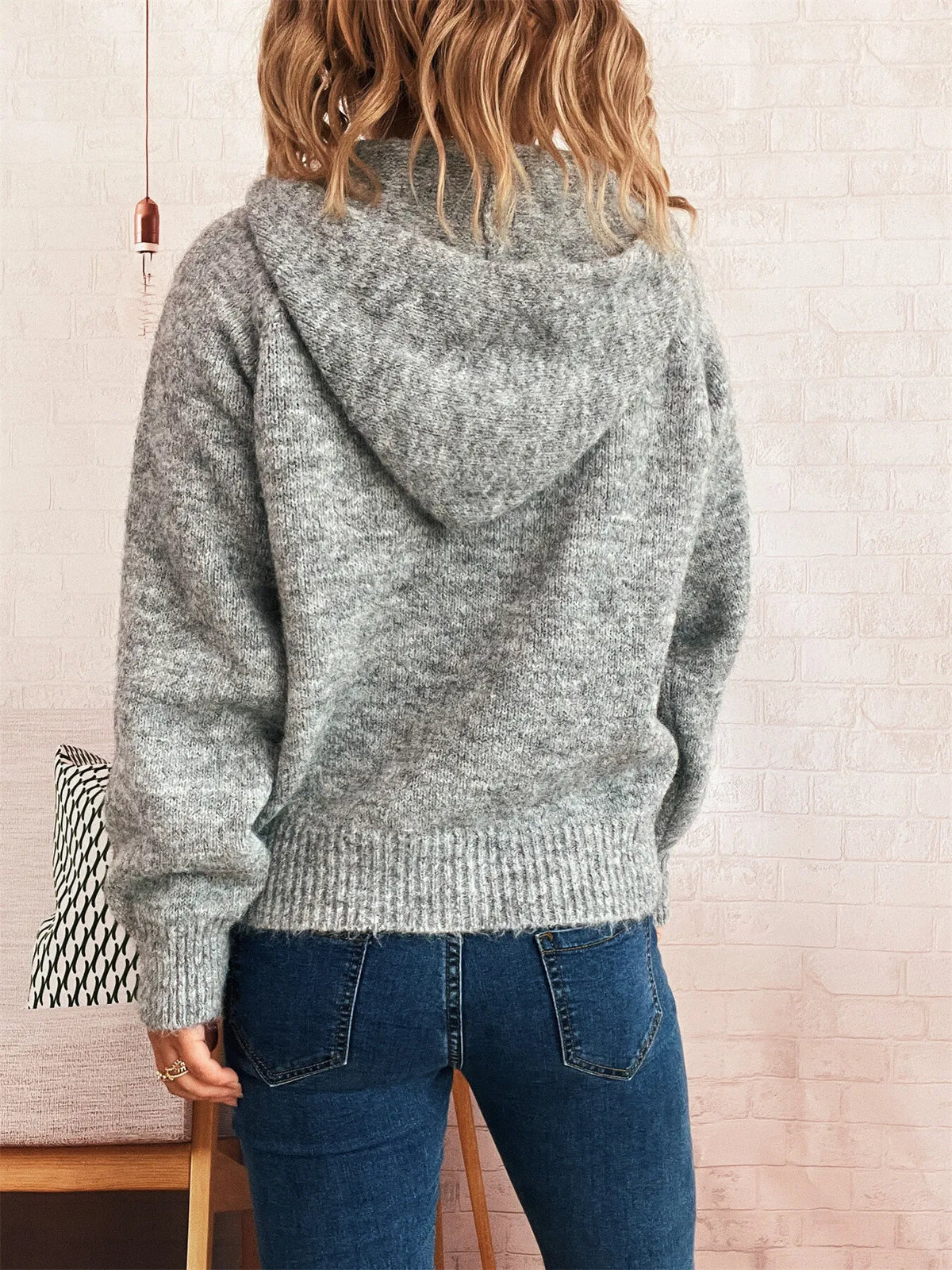 Ribbed hem sweater styled with jeans