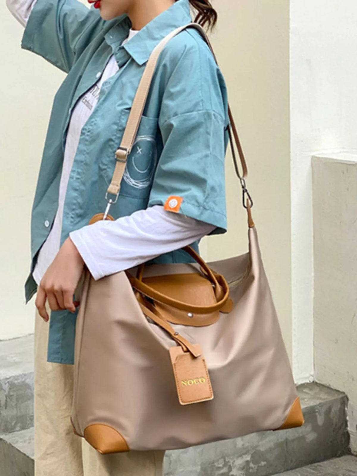 Khaki Oxford cloth travel duffel bag front view