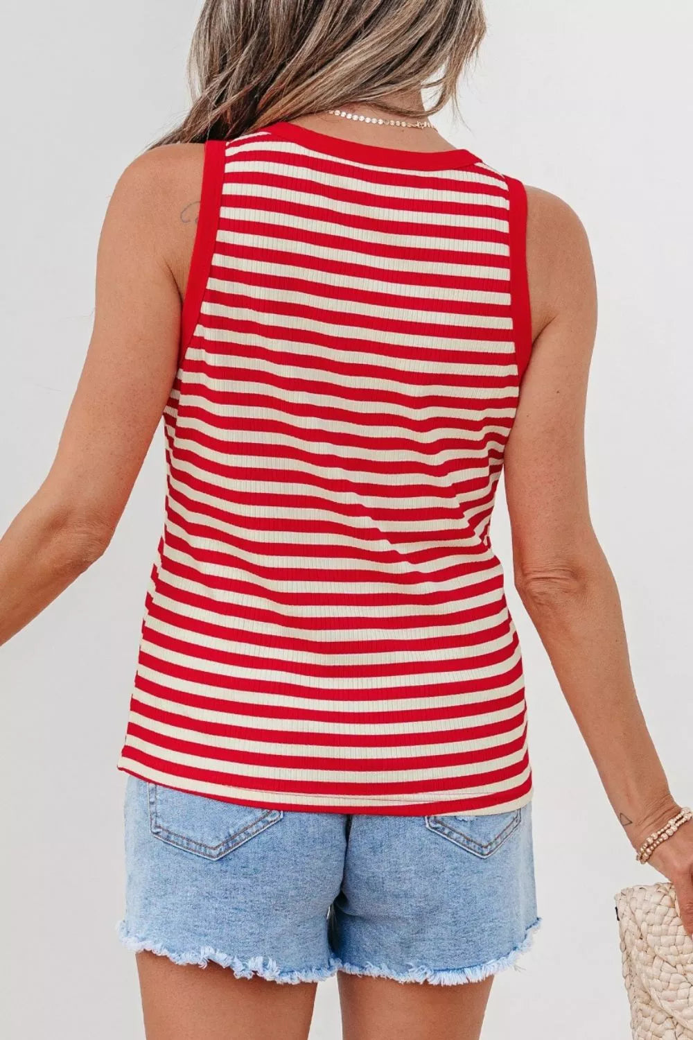 Ribbed knit tank top button detail close up