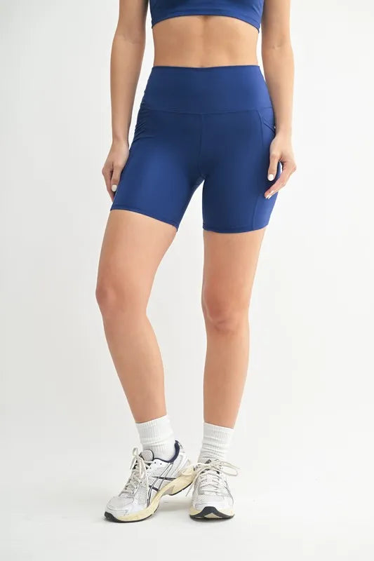 mono b cloud sculpt biker shorts in blue depth front view