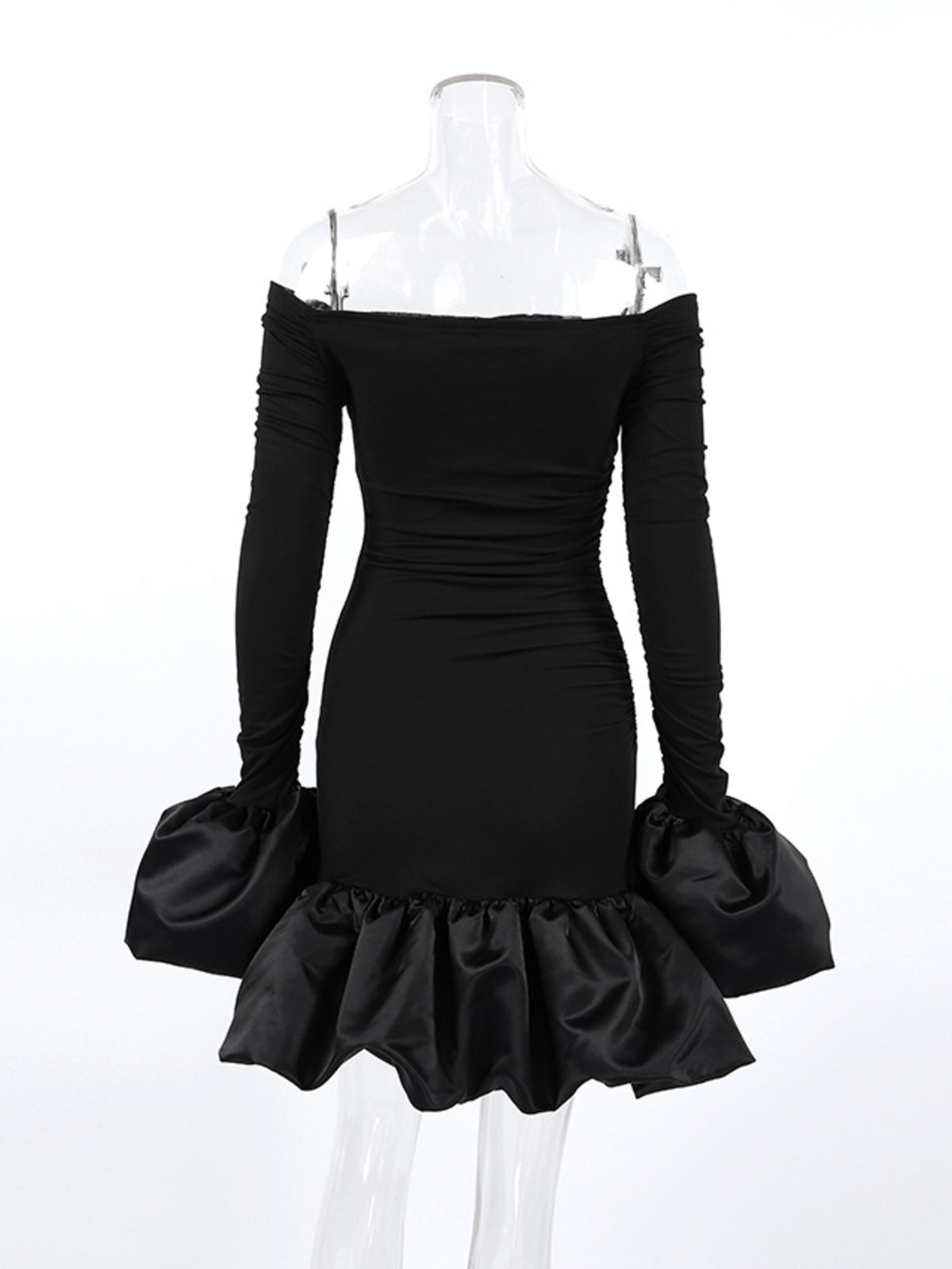 Black off shoulder ruffle hem mini dress seated view