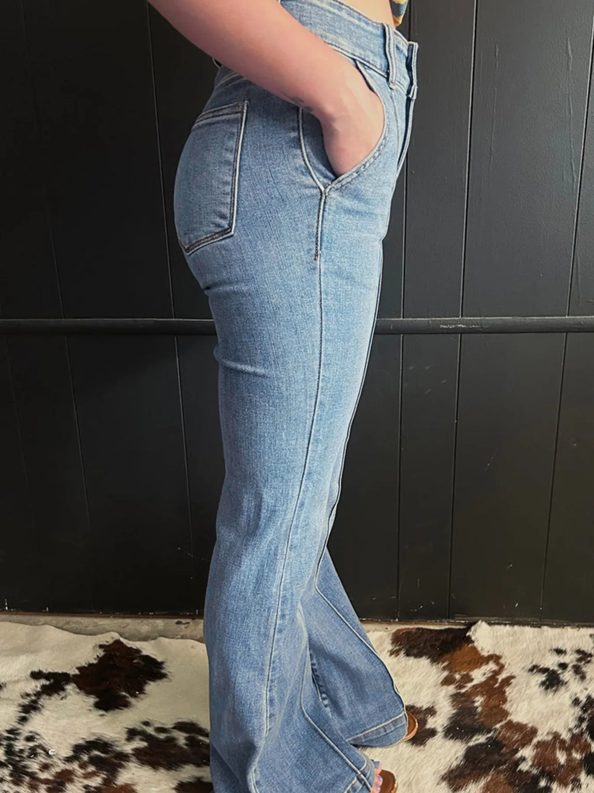 Side view of high waisted flare jeans