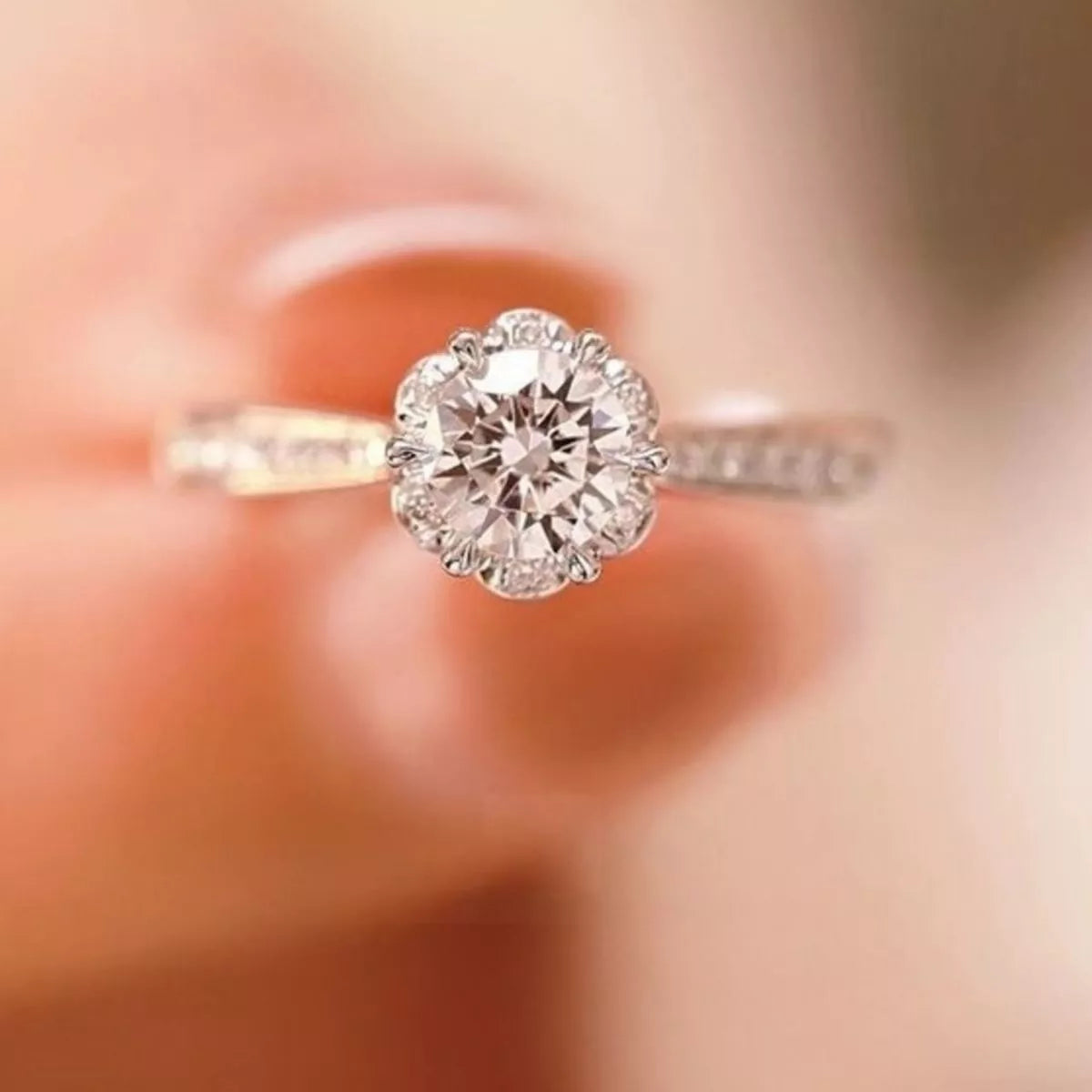 Moissanite ring shown catching direct light