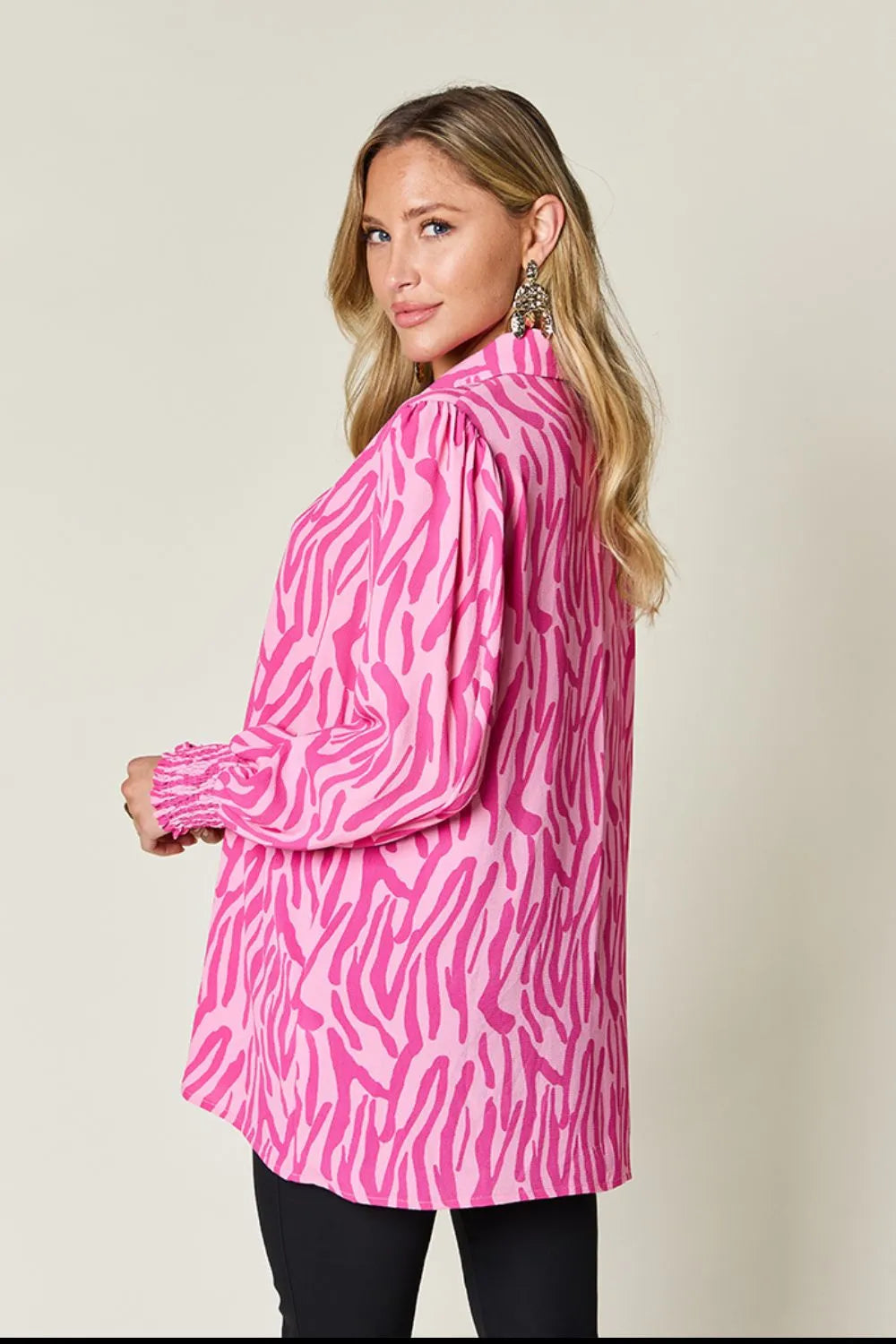 Sleeve drape detail of the polyester blouse
