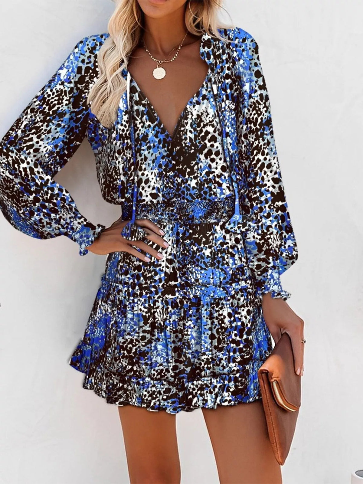 Tie neck lantern sleeve tiered dress front view