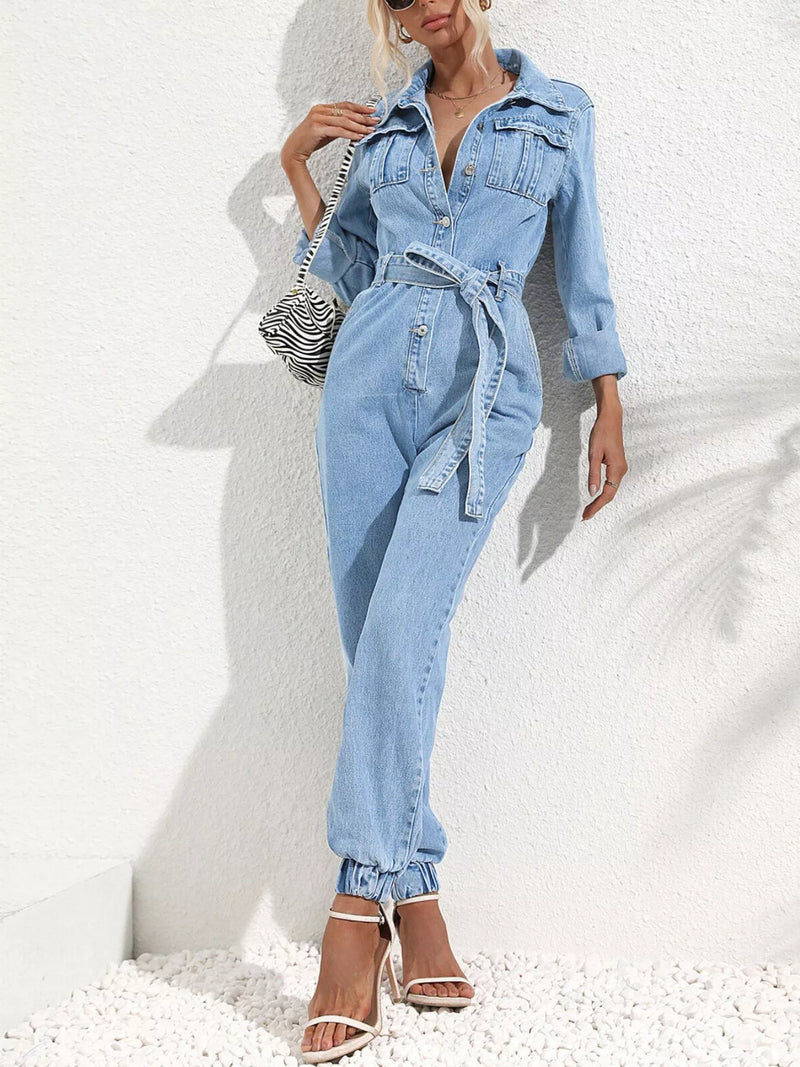 Medium blue denim jumpsuit with button front, front view