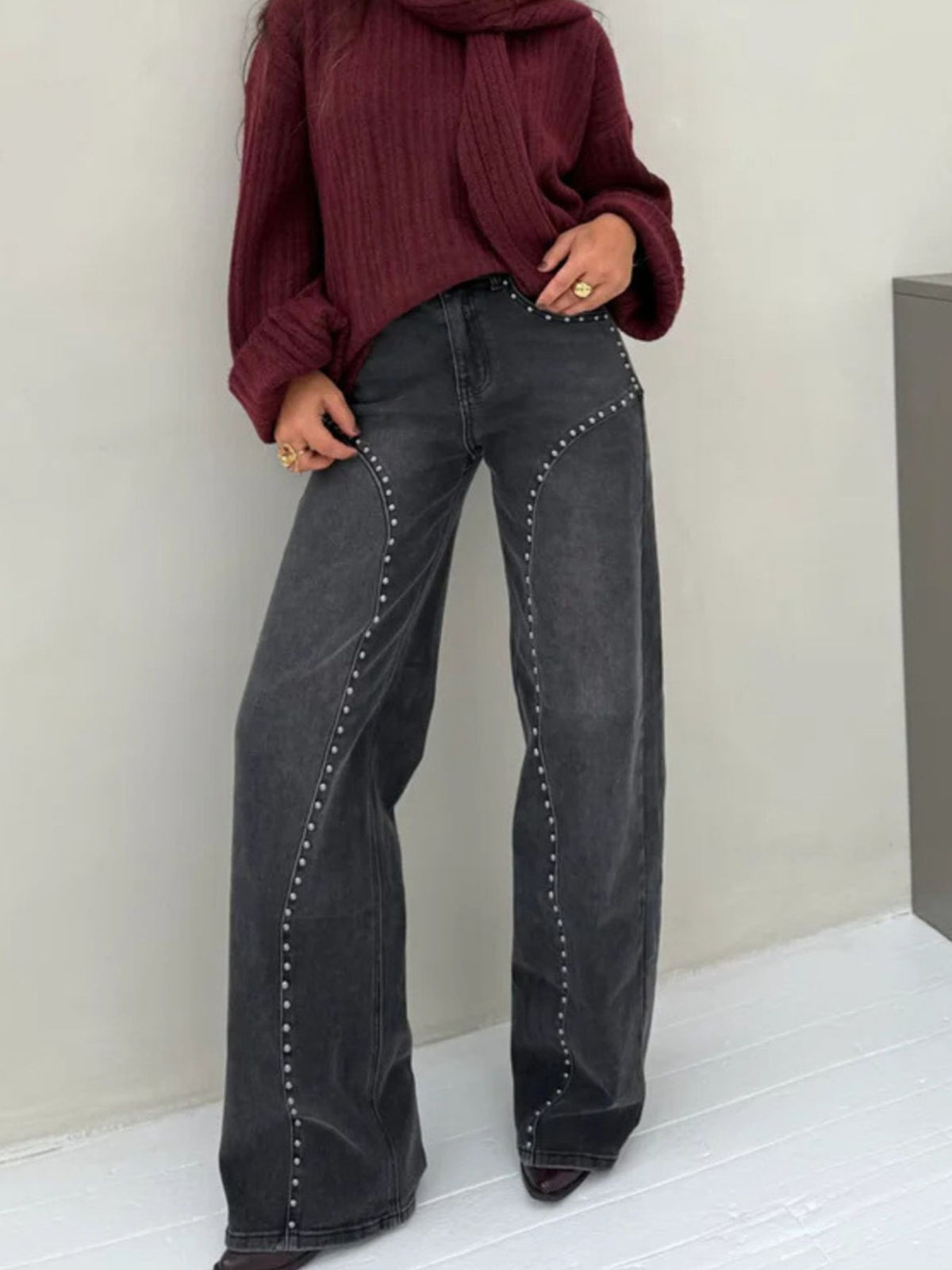 Studded wide leg jeans in dark gray styled