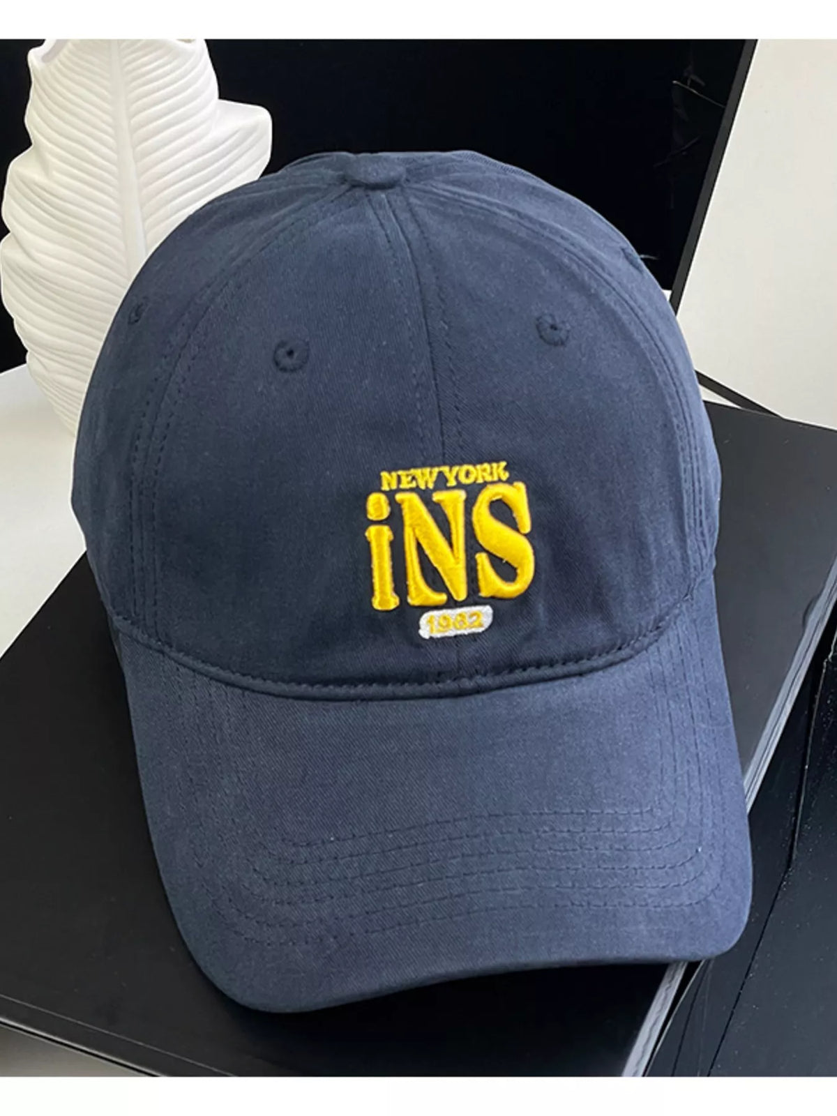 Cotton baseball cap styled with a casual outfit