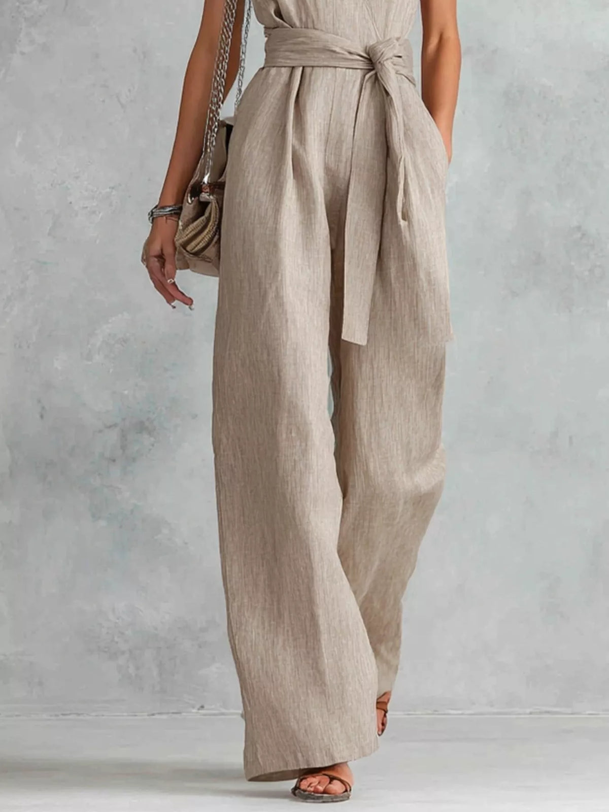 Tie waist detail on sleeveless wide leg jumpsuit