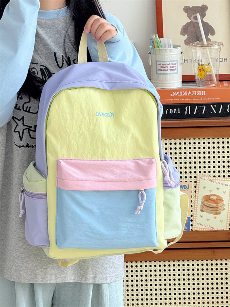 Color block nylon backpack in pastel yellow front view