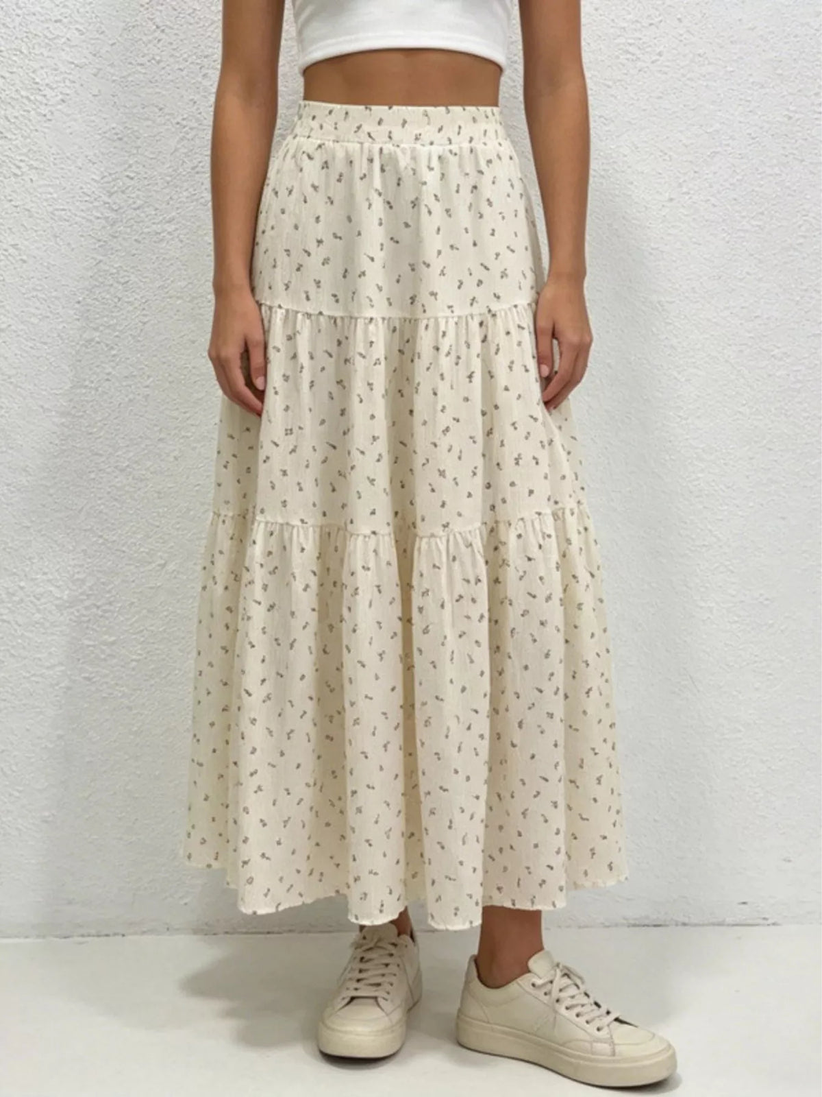 Beige floral maxi skirt on model