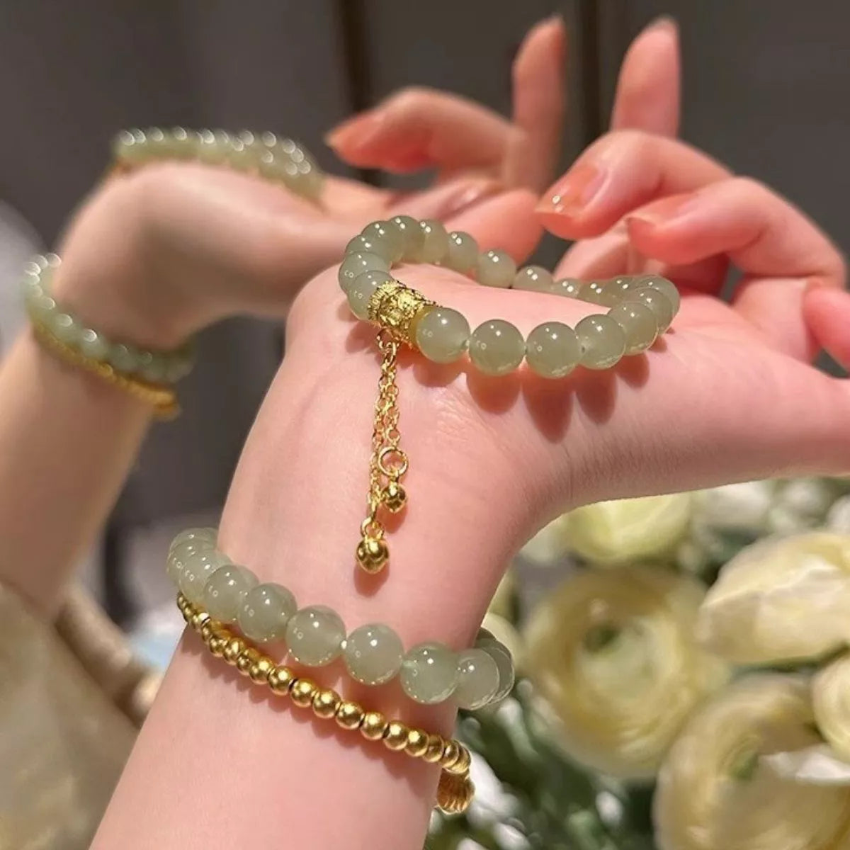 Green jade beaded bracelet with gold plated accents