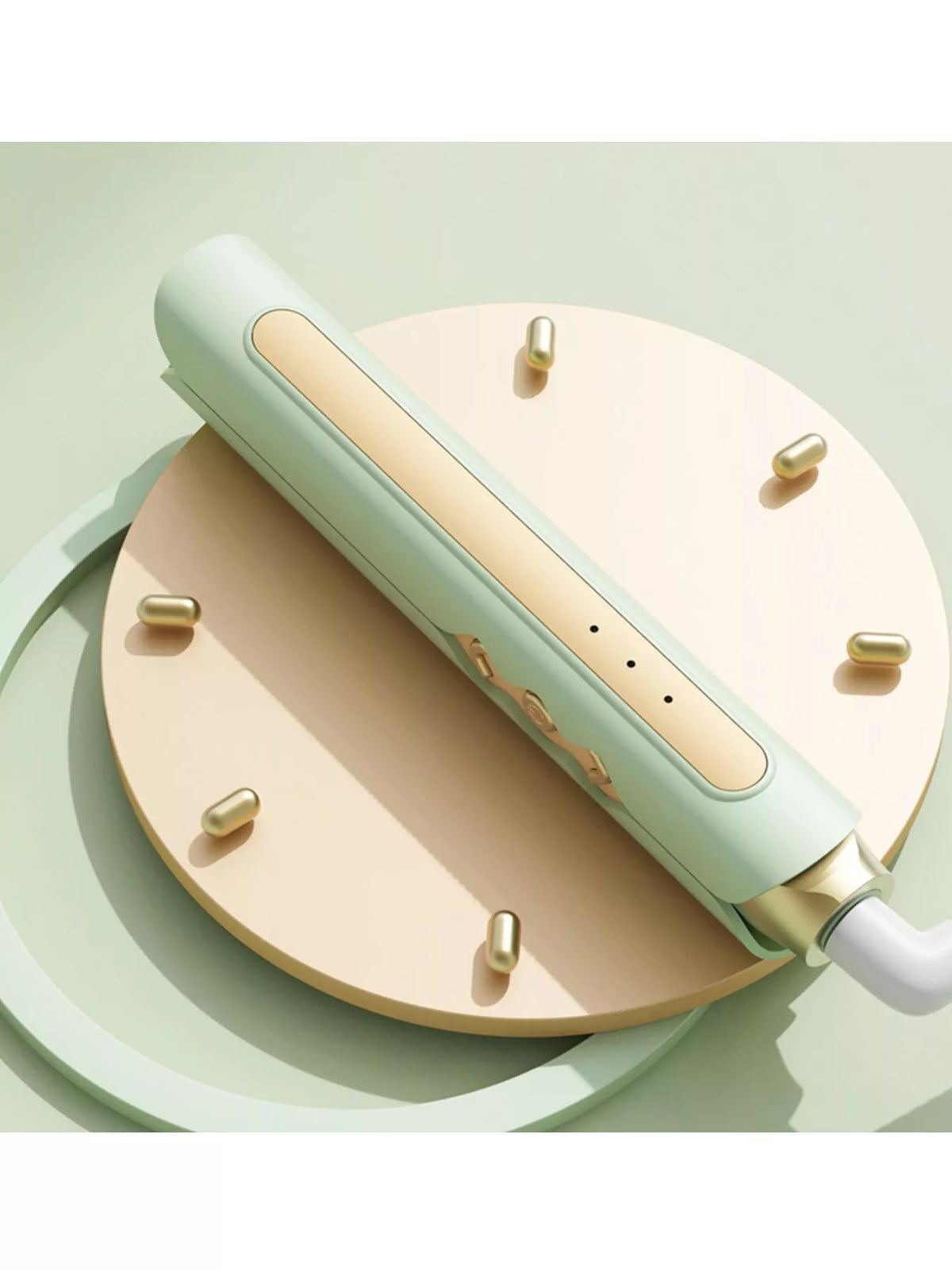 Straightener smoothing a section of hair