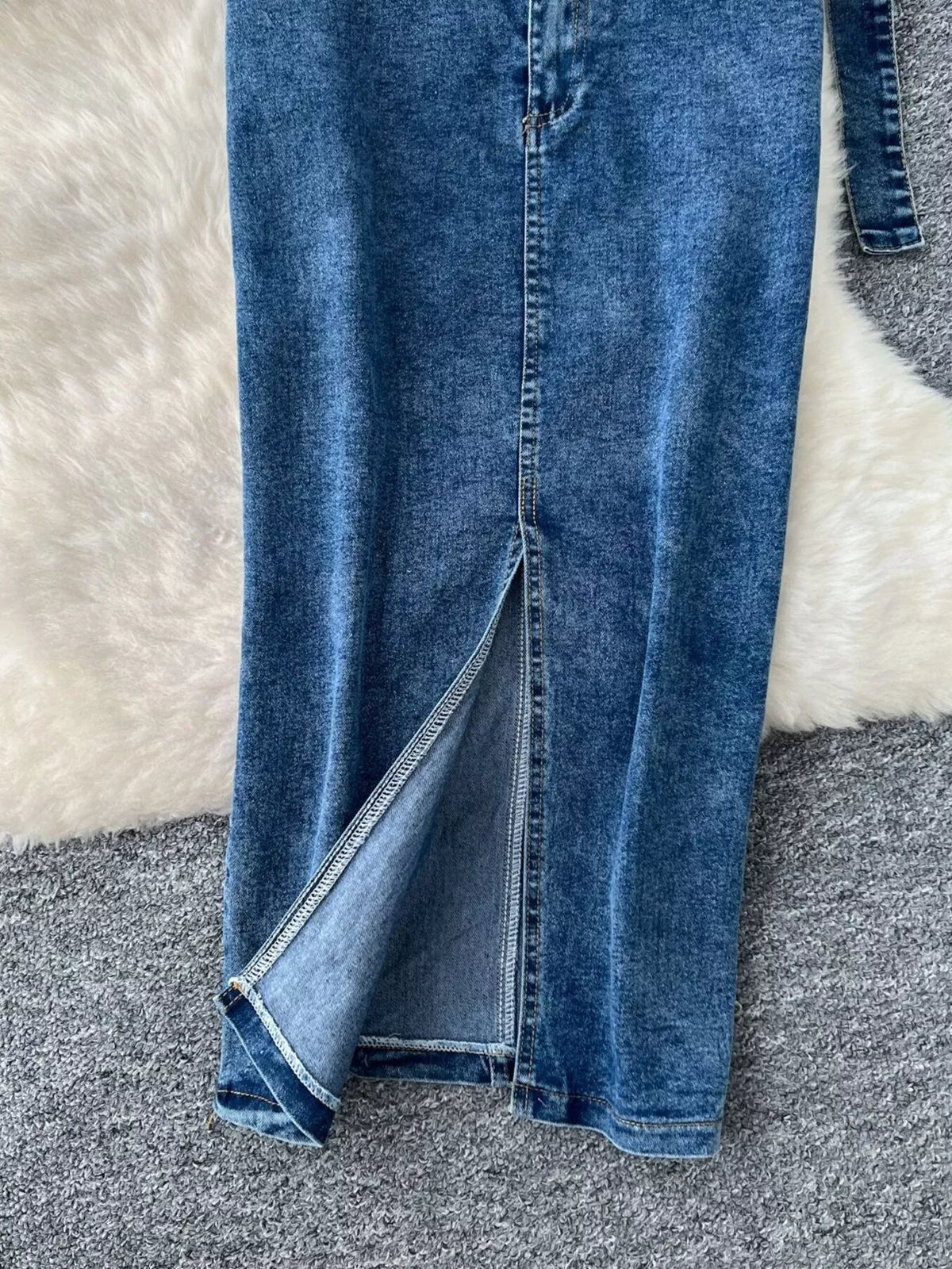 Belted denim maxi skirt with high slit detail