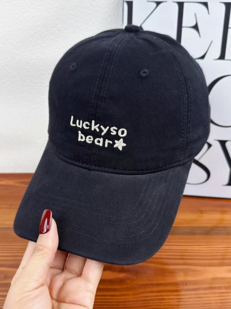 Bear embroidered baseball cap shown from the front
