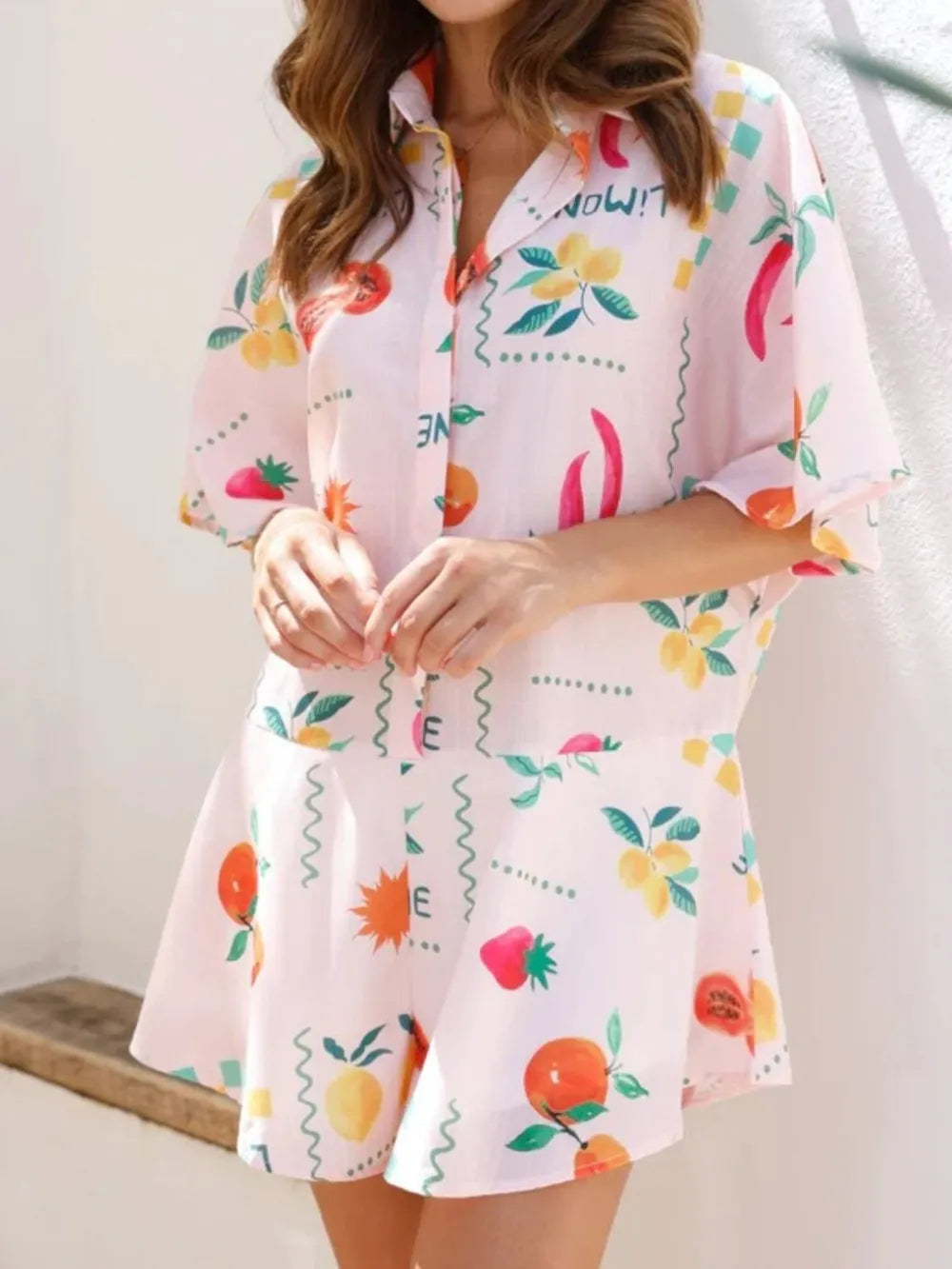 Collared romper button front detail
