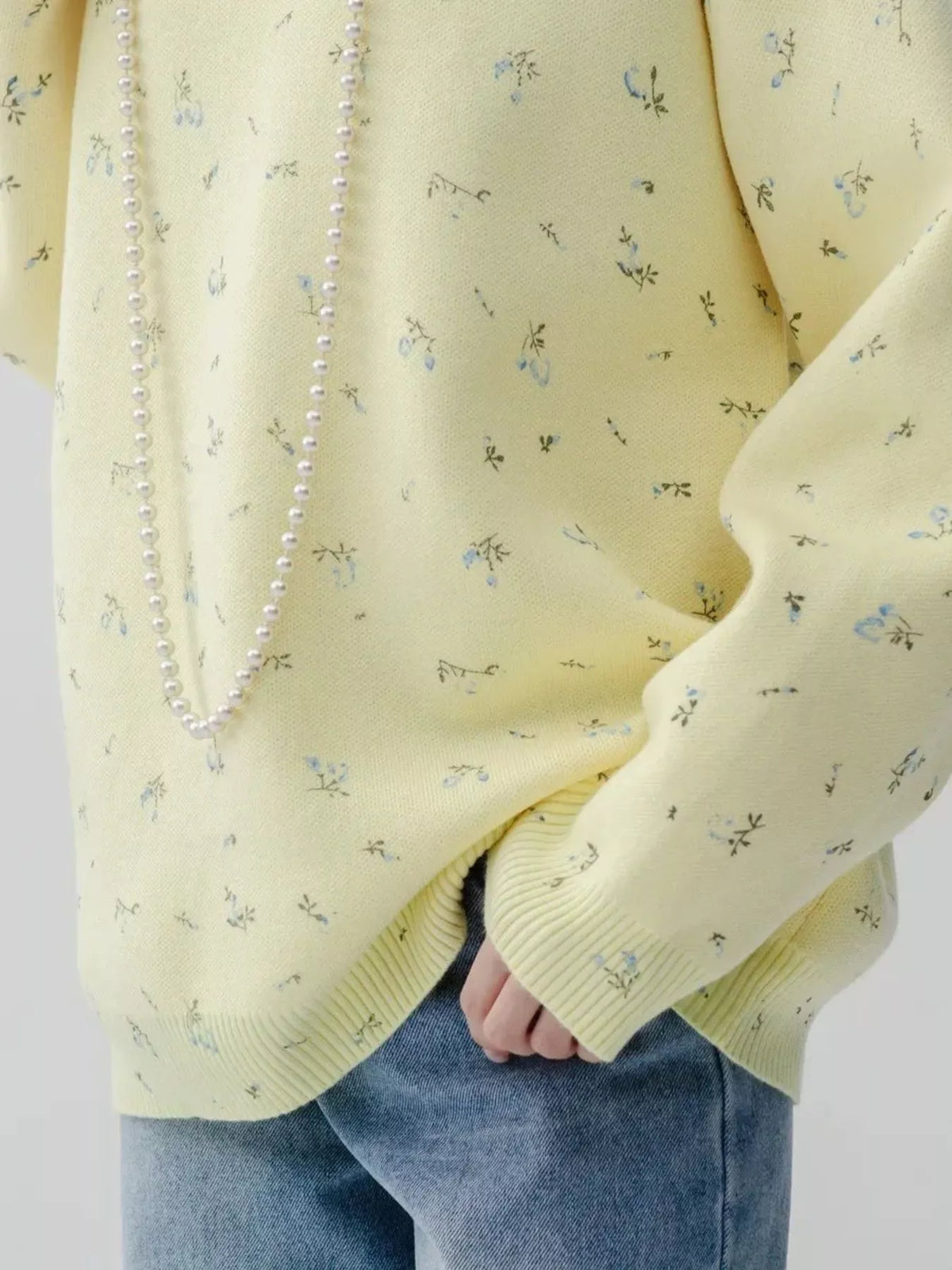 ribbed hem floral long sleeve sweater hem detail