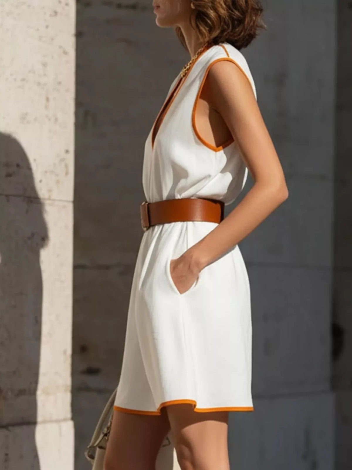 Front view of the contrast trim sleeveless dress