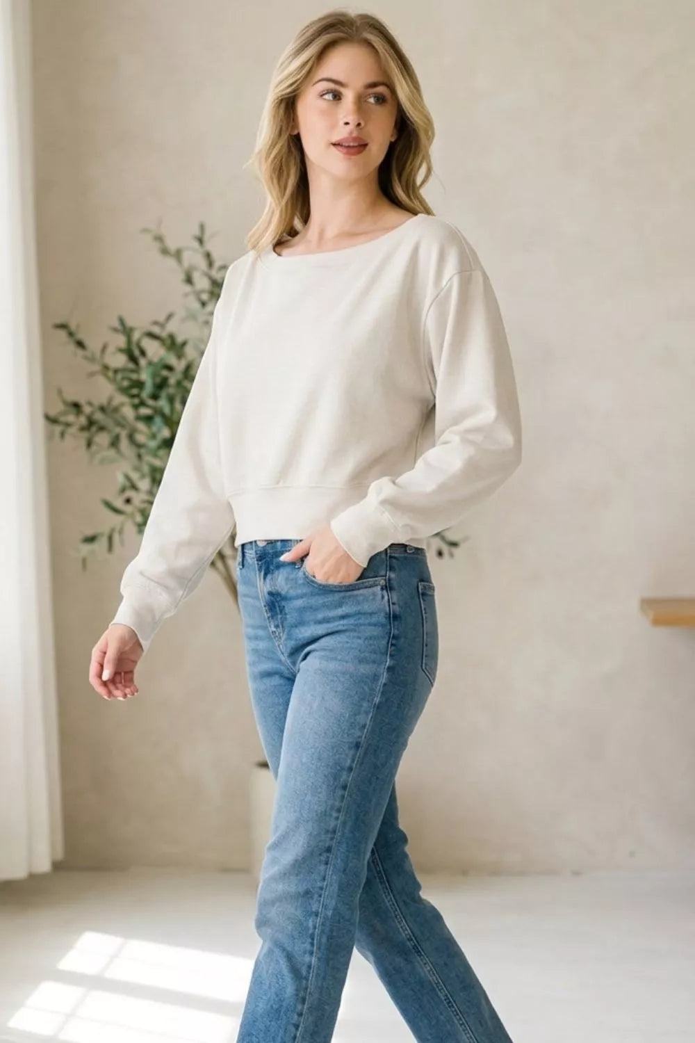 Boat neck cropped pullover detail view