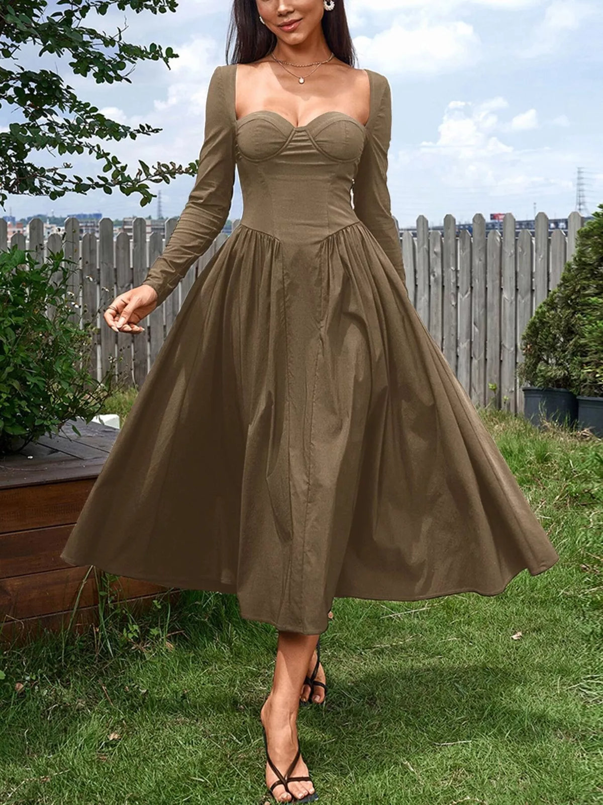 Long sleeve sweetheart dress standing view