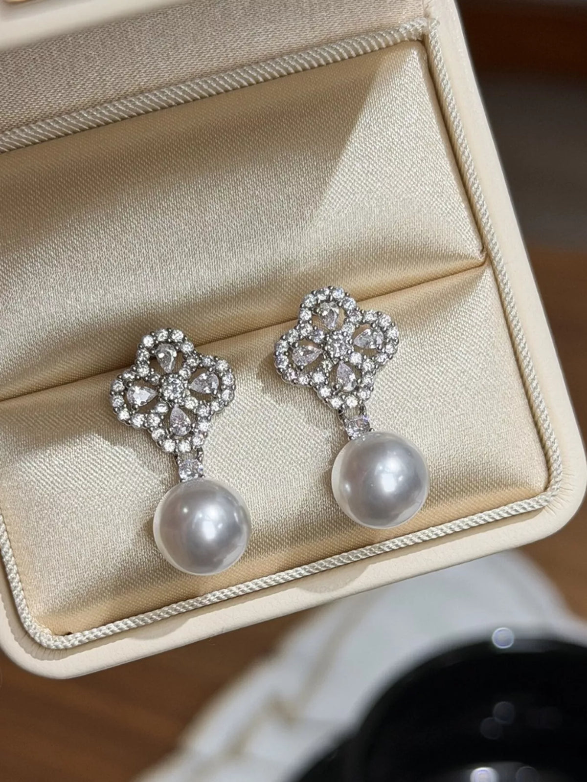 Zircon clover pearl earrings styled view