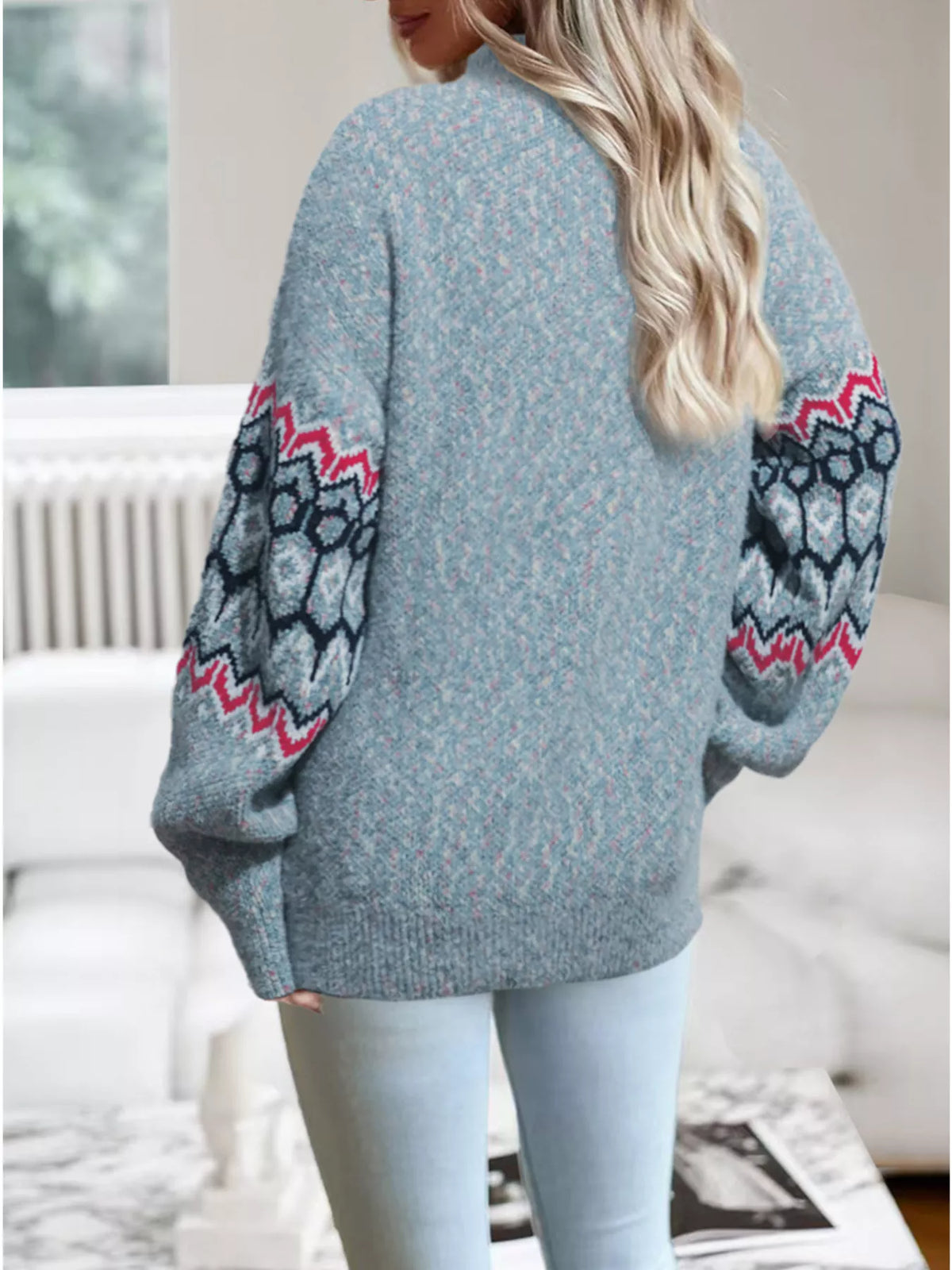 Grayish blue geometric pattern sweater fabric detail view
