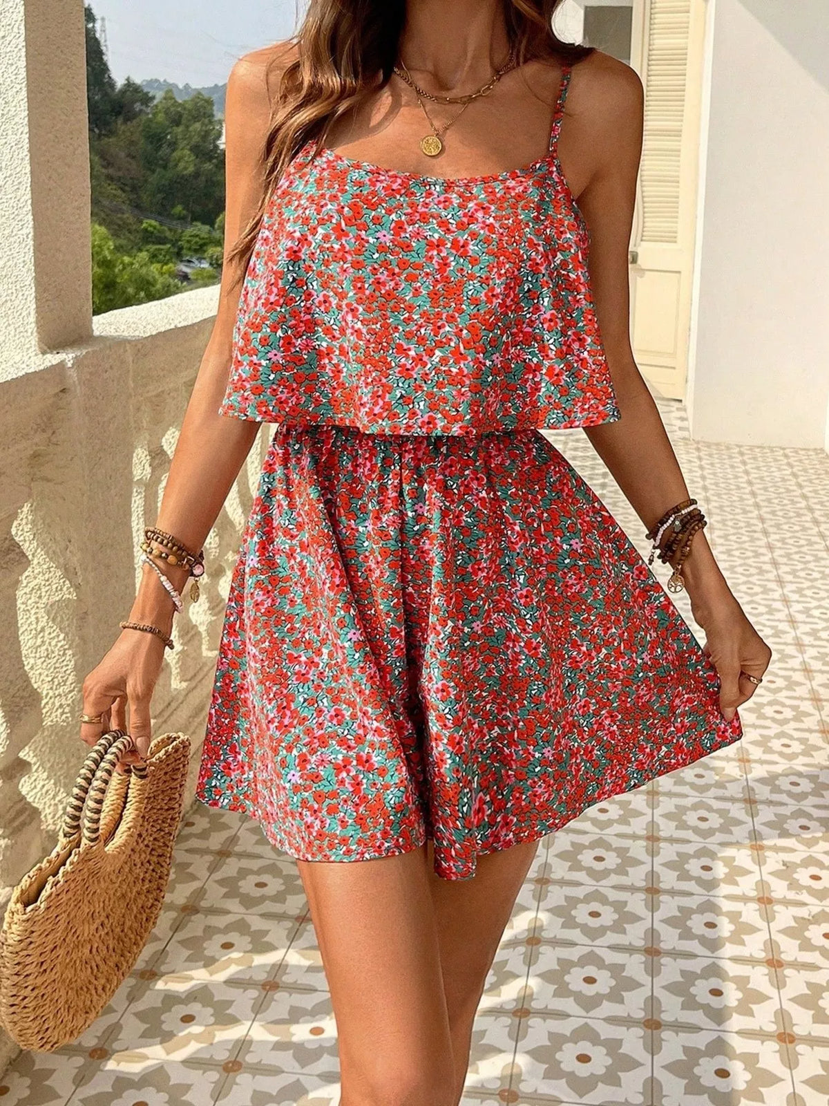 Back view of the green floral romper