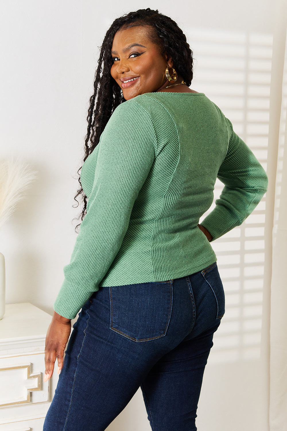 Green long sleeve top back view